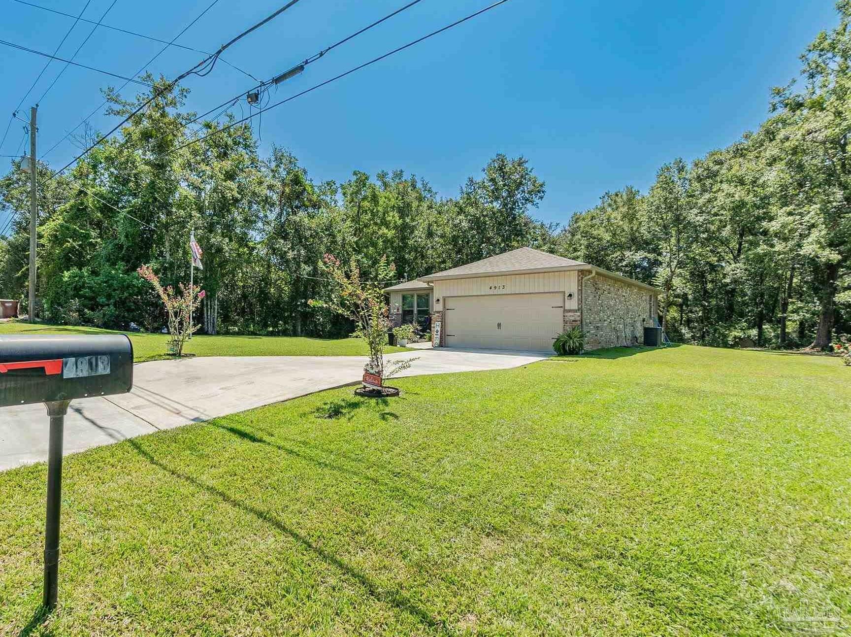 Property Photo:  4913 Forest Creek Dr  FL 32571 