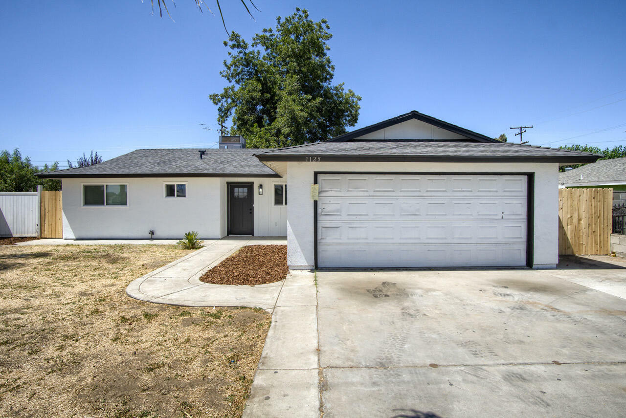 Property Photo:  1125 N Farmersville Boulevard  CA 93223 