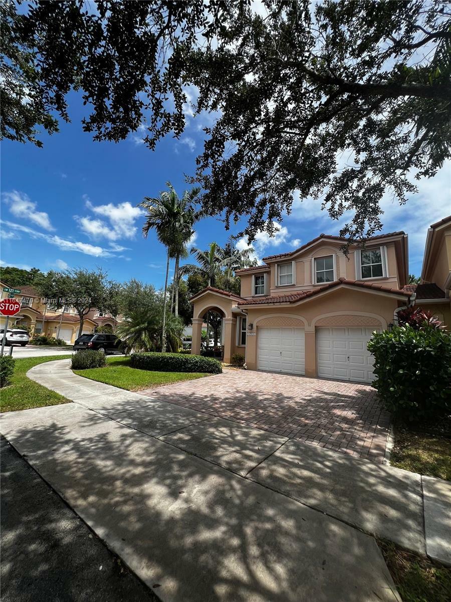 Property Photo:  12135 SW 122nd Pass  FL 33186 