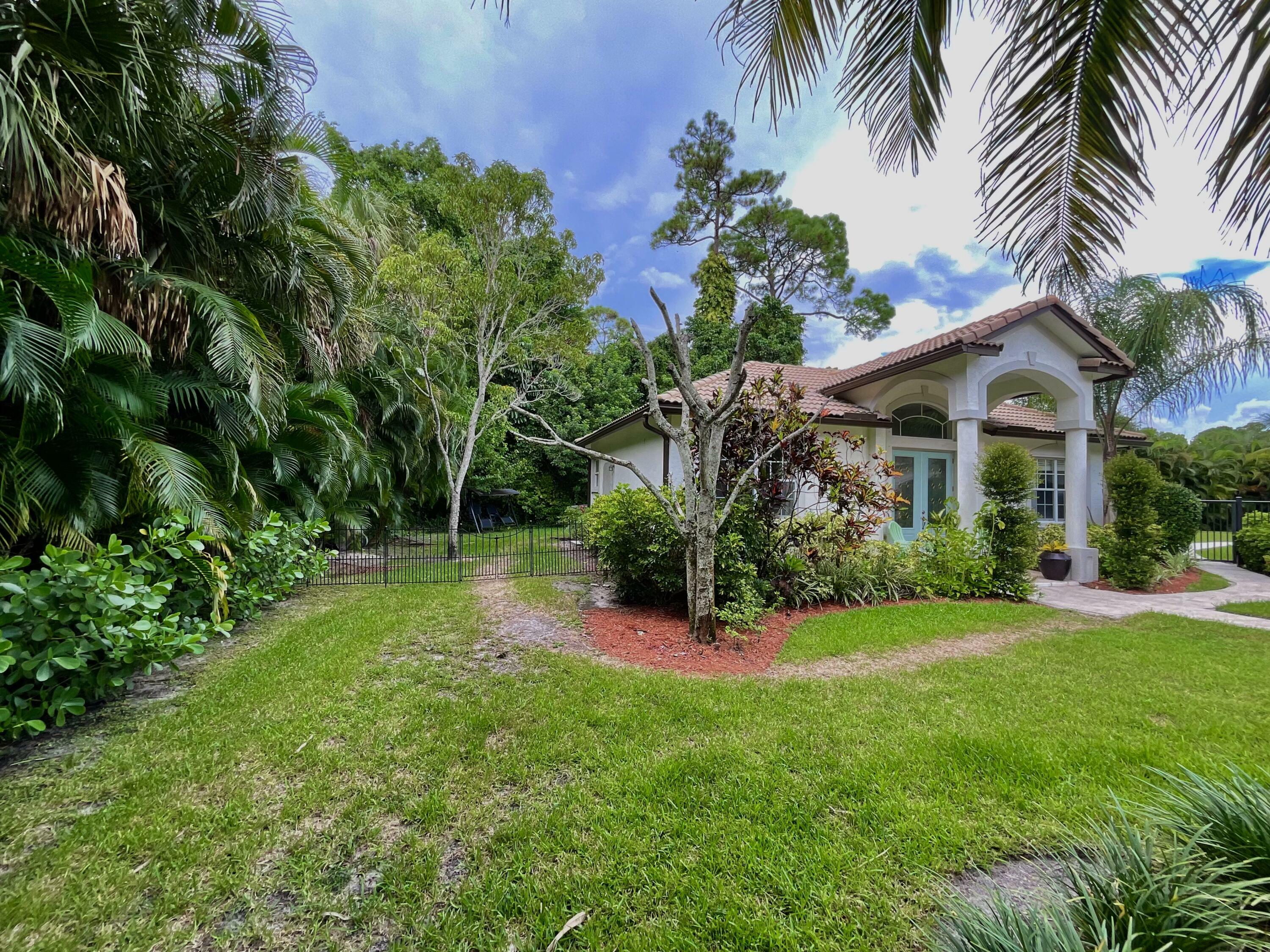 Property Photo:  12132 Quercus Lane  FL 33414 