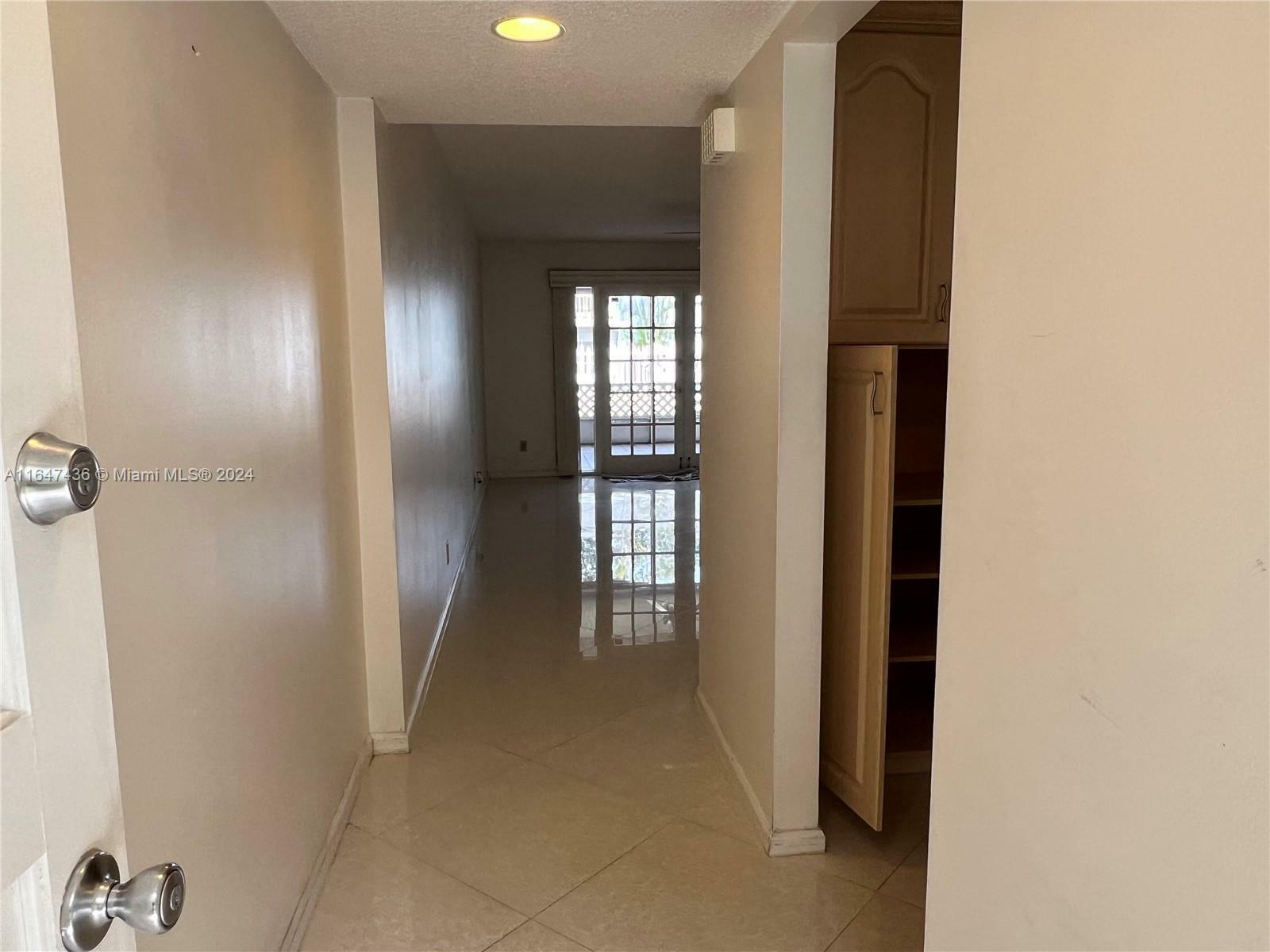 Property Photo:  7556 Stirling Rd 122  FL 33024 