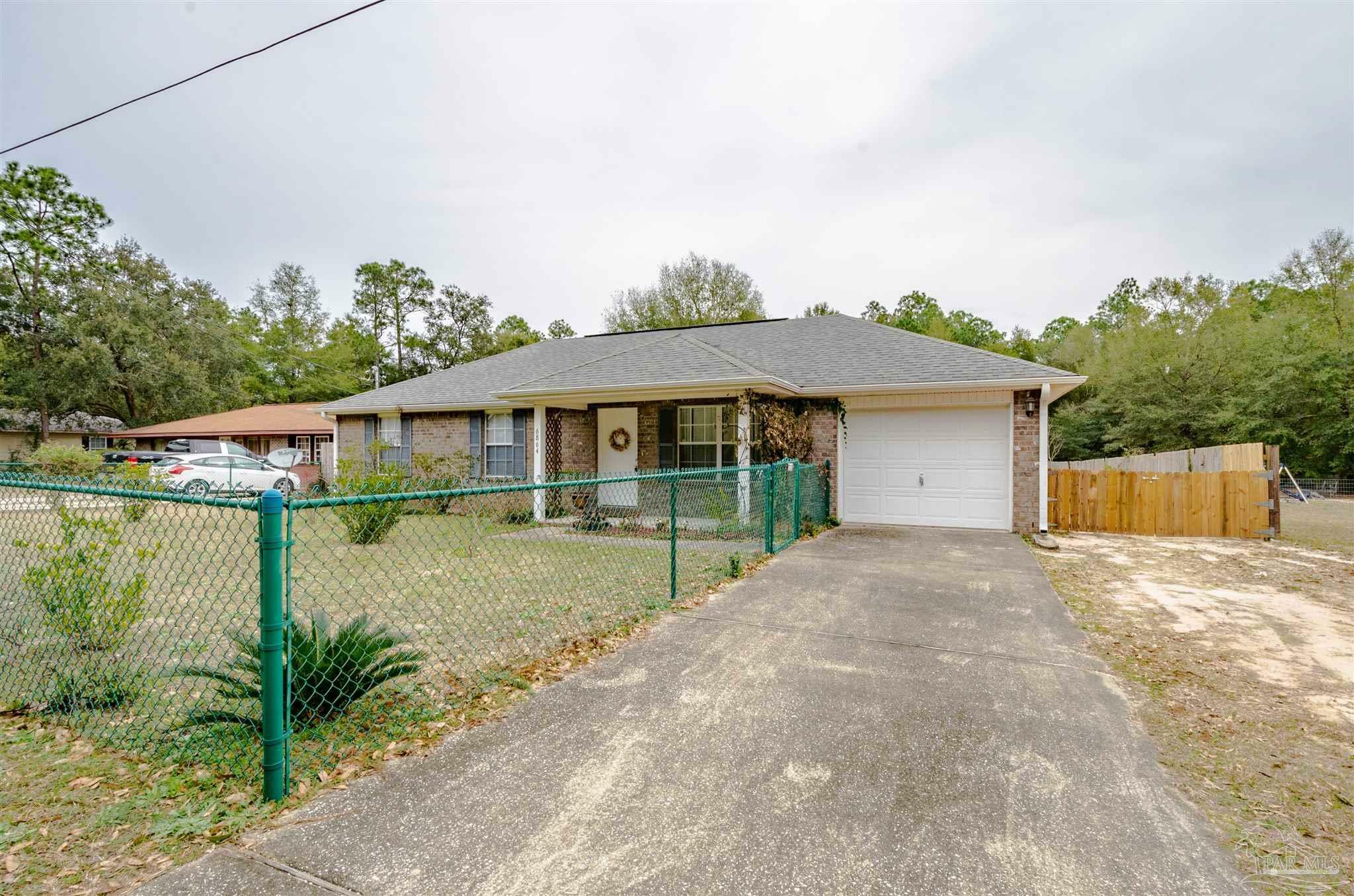 Property Photo:  6864 Fast Gun Ln  FL 32570 