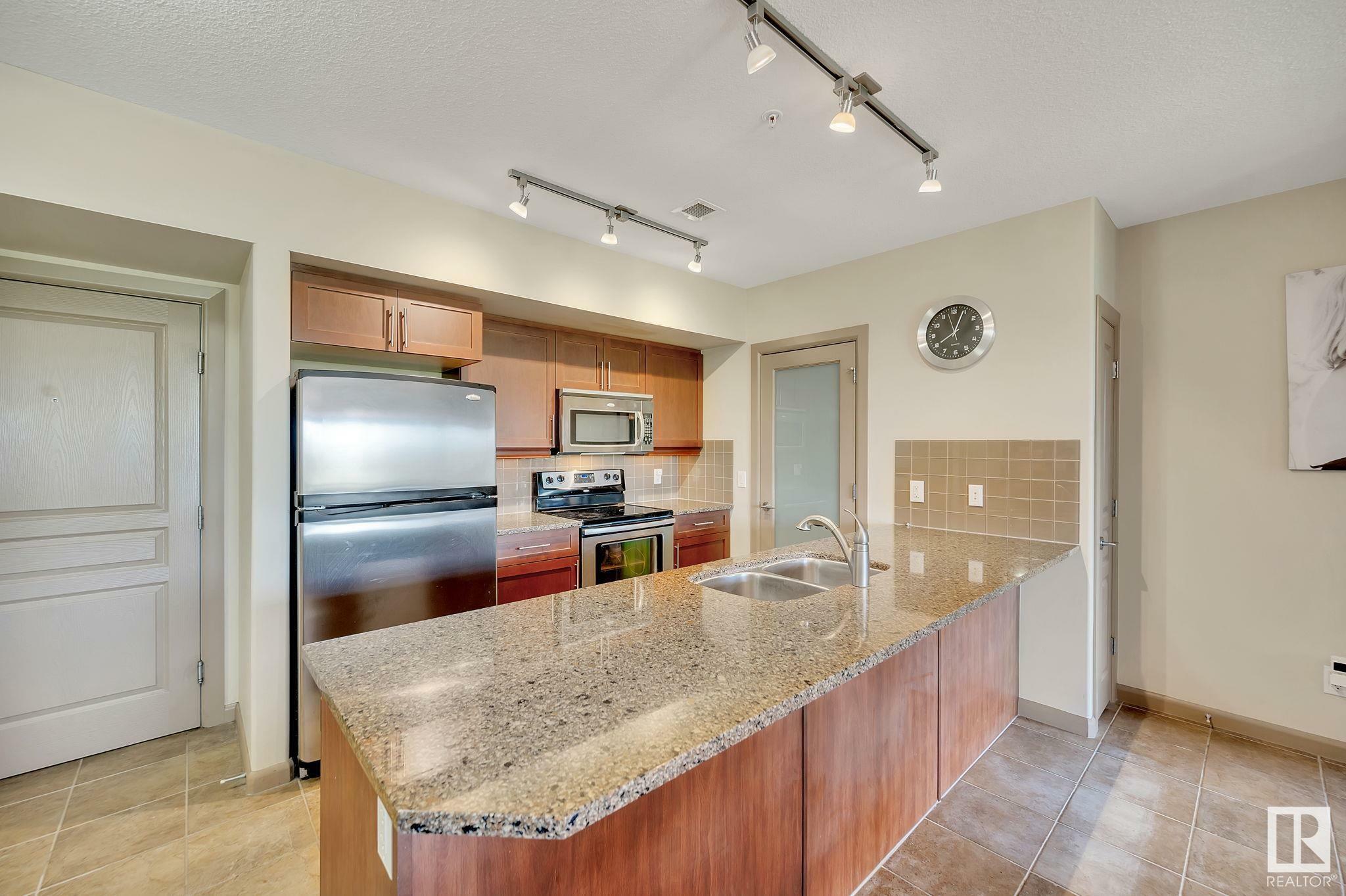 Property Photo:  500 Palisades Way 217  AB T8H 0H7 