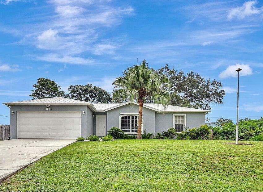 Property Photo:  1631 SW Norman Lane  FL 34984 