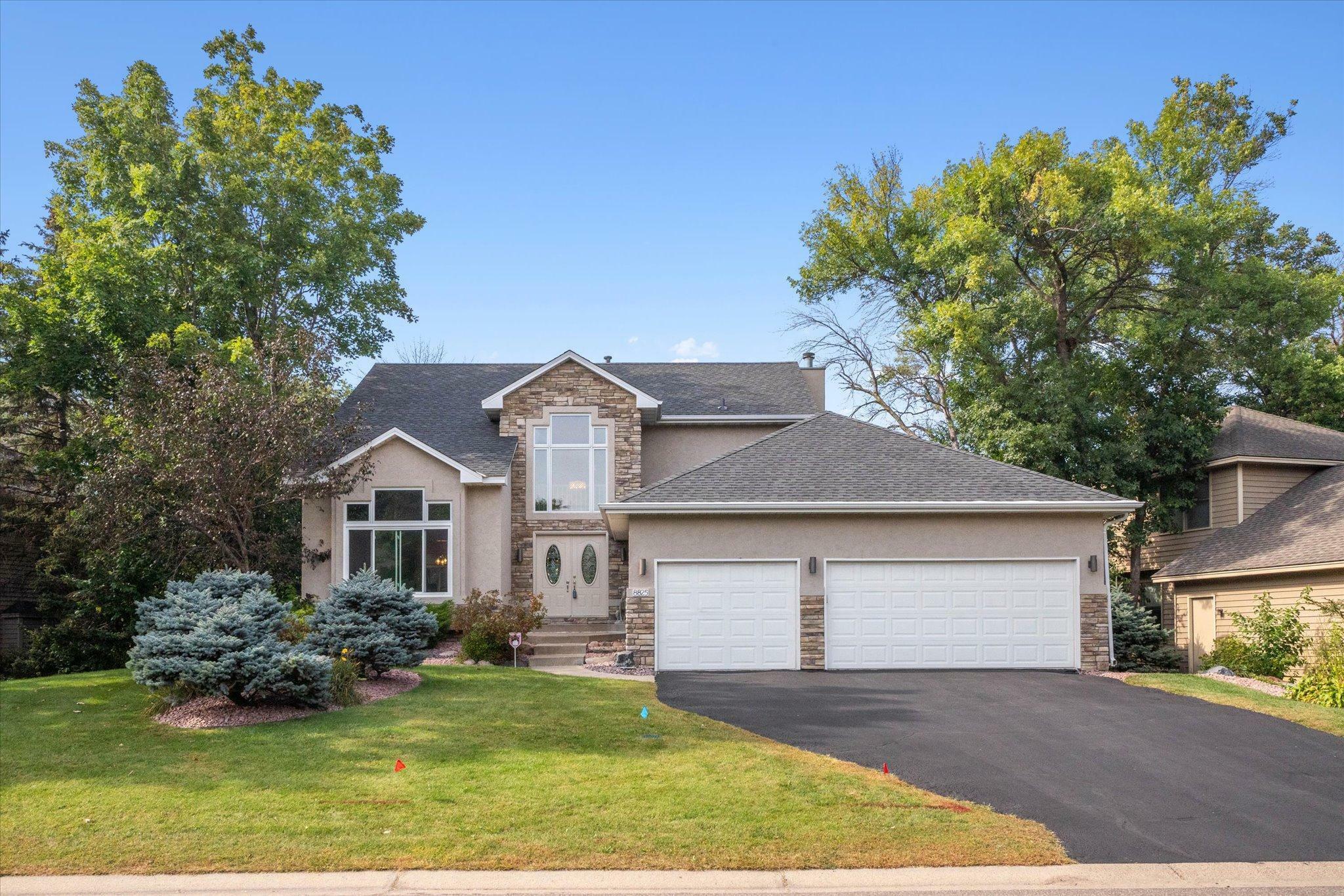 Property Photo:  8825 Telford Crossing  MN 55443 