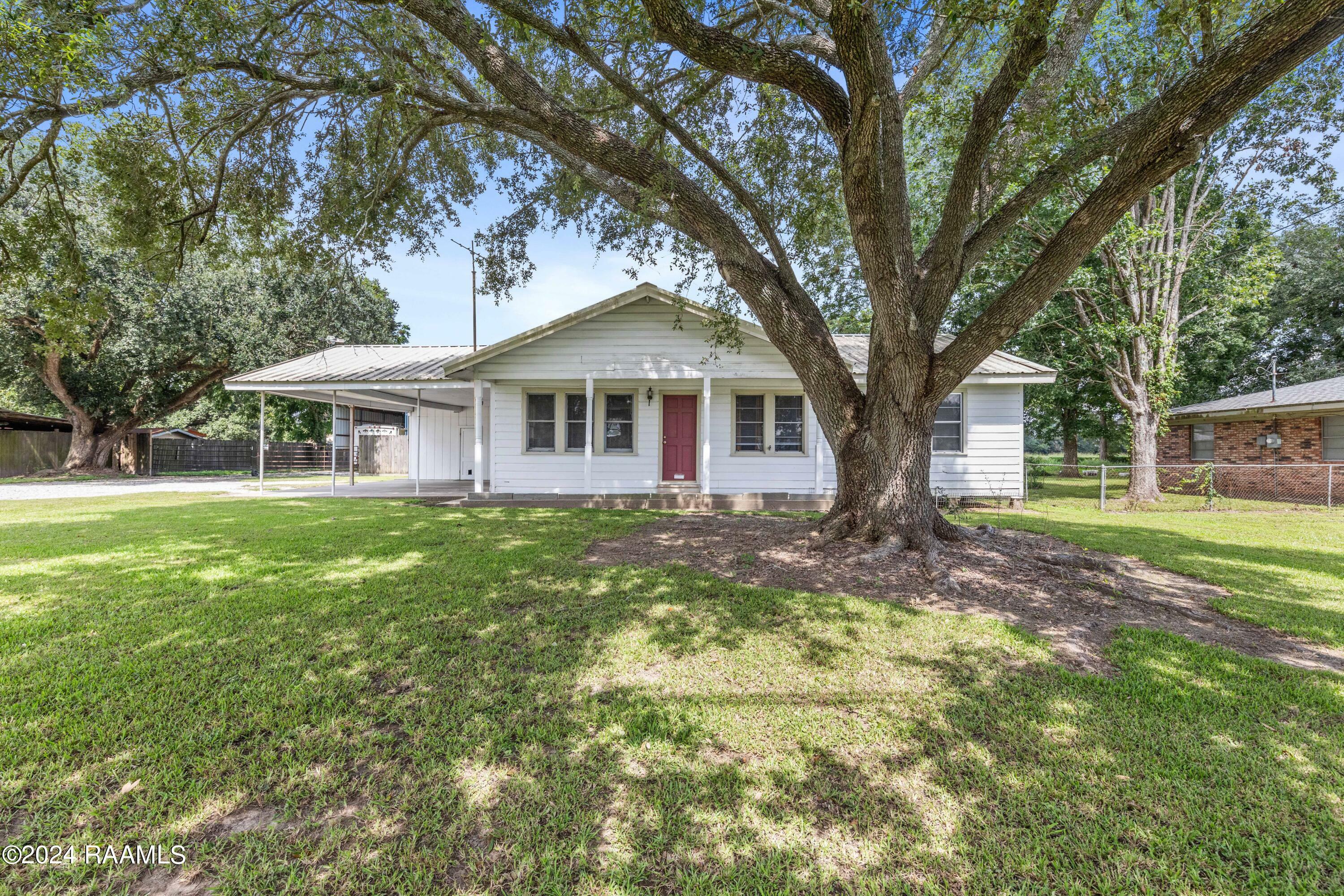 Property Photo:  129 E Broussard Road  LA 70503 