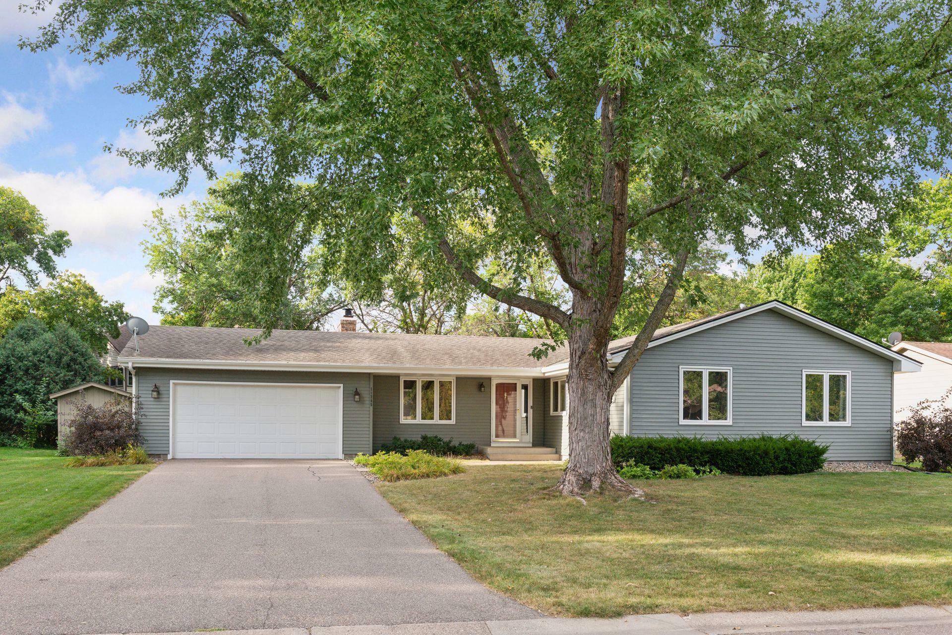 Property Photo:  11205 52nd Avenue N  MN 55442 