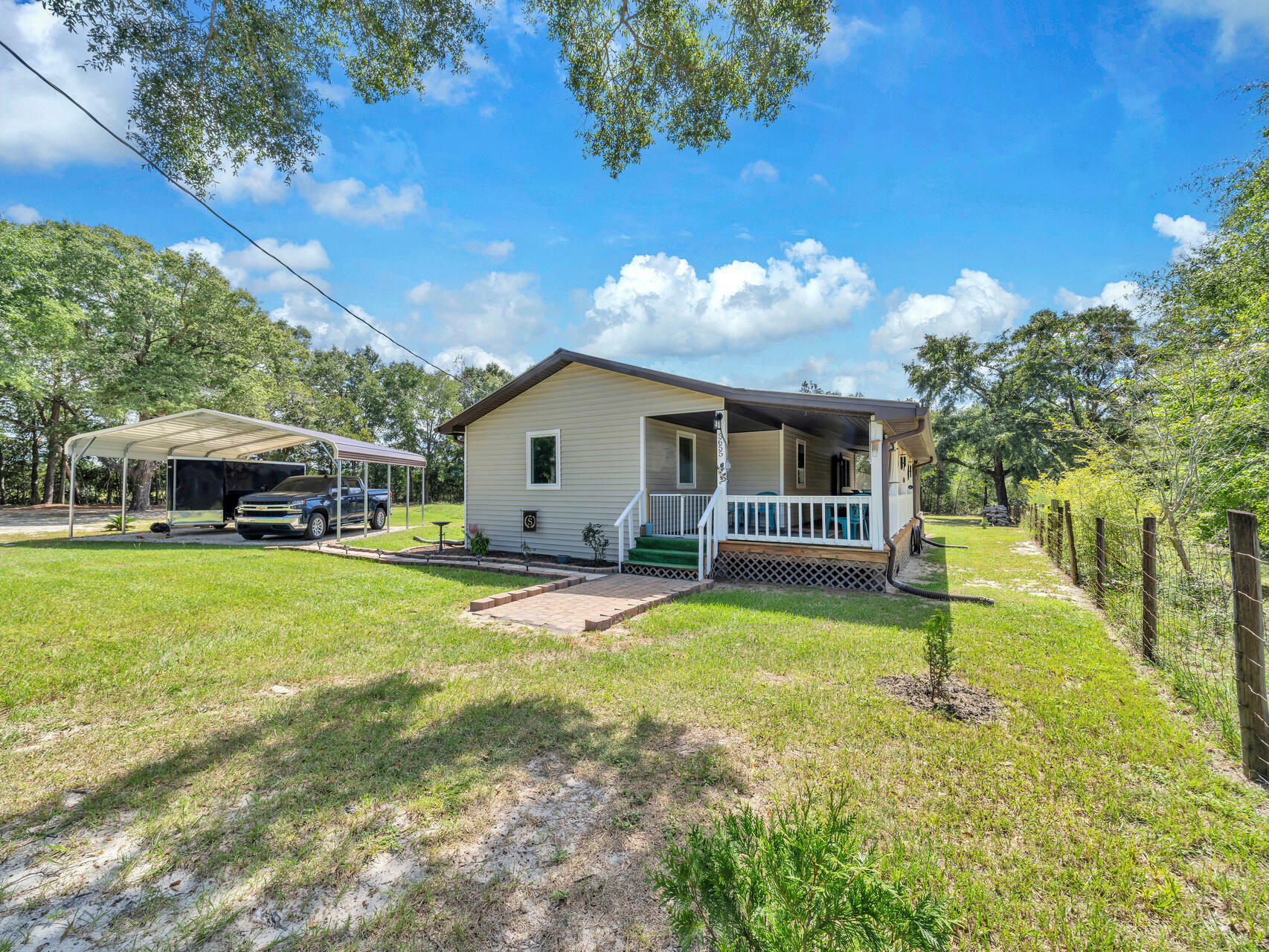 Property Photo:  5655 Jv Woolley Road  FL 32539 