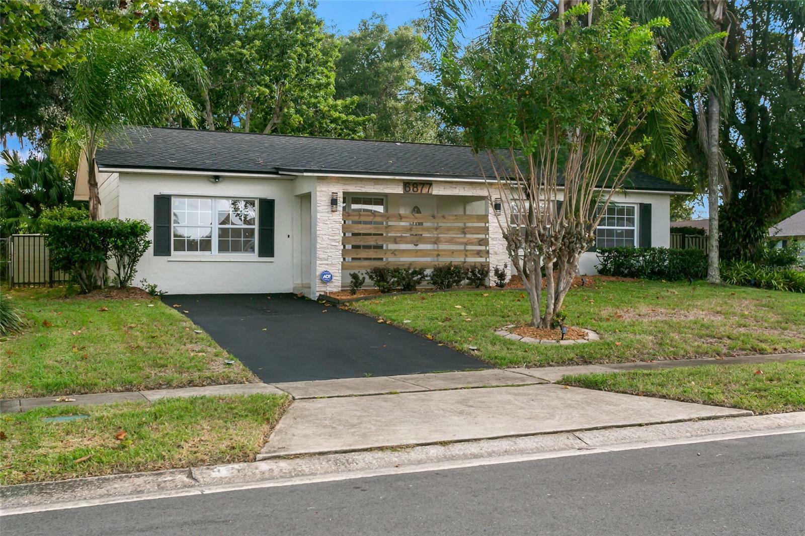 Property Photo:  6877 Firebird Drive  FL 32810 