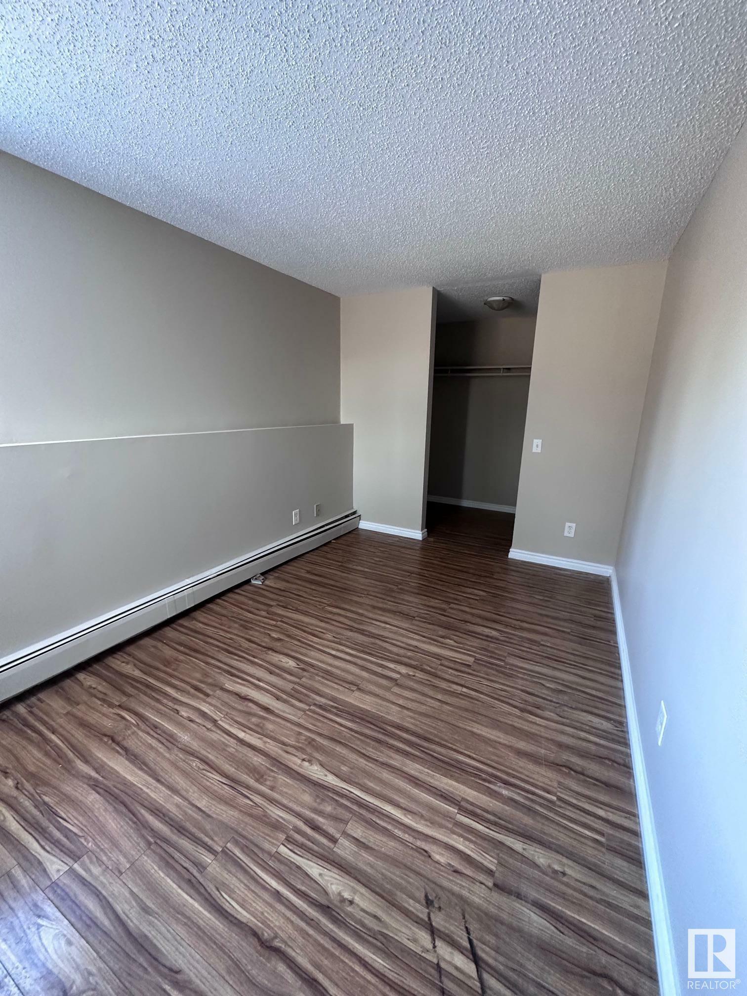 Property Photo:  14816 26 Street NW 102  AB T5Y 2G4 