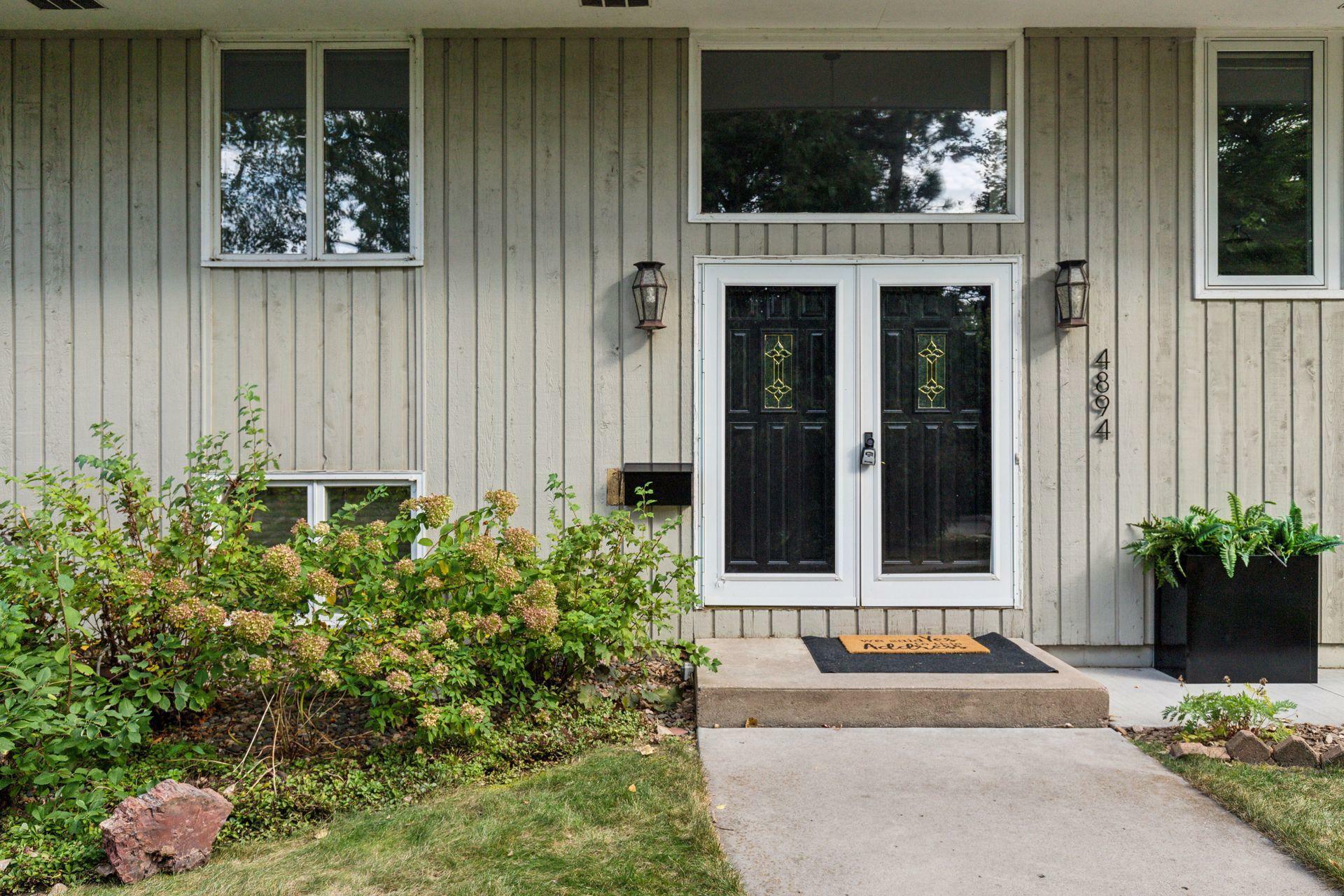 Property Photo:  4894 Maple Street  MN 55126 