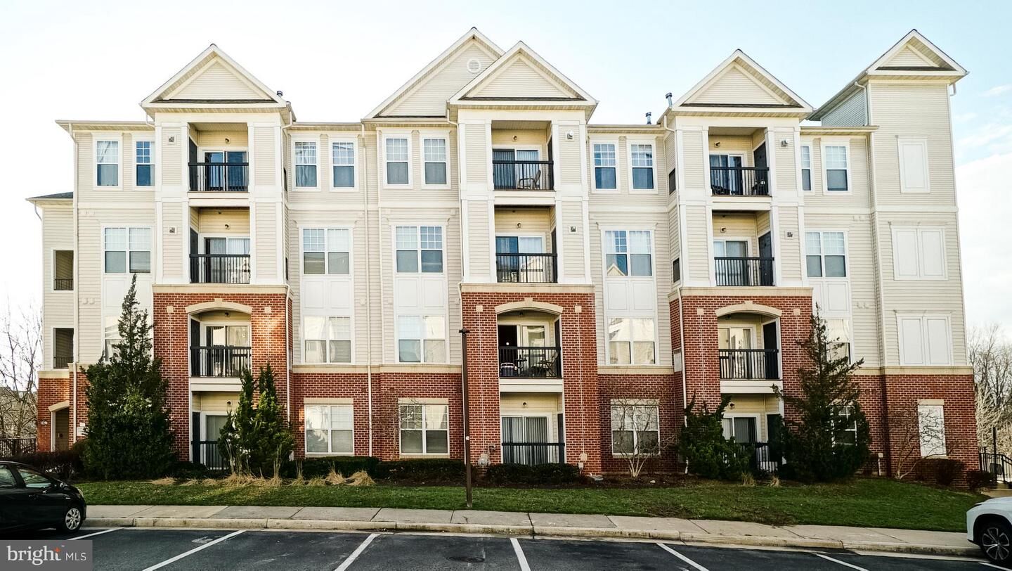 Property Photo:  11350 Aristotle Drive 7-204  VA 22030 