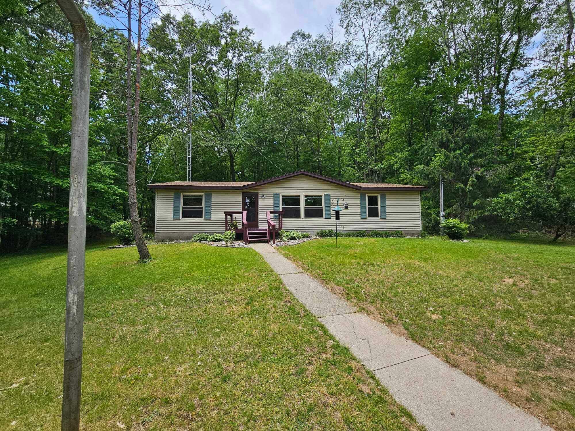 Property Photo:  13707 Tisdel Avenue NE  MI 49319 