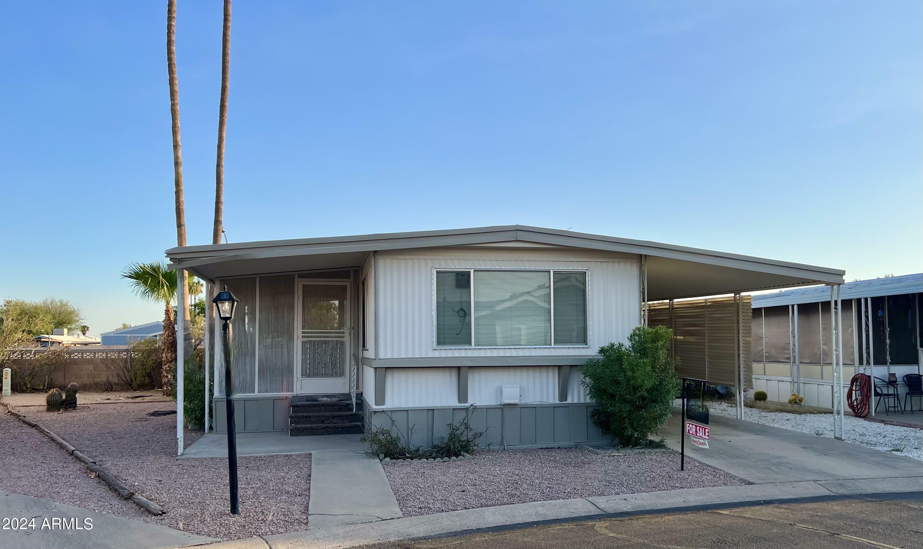 Property Photo:  11411 N 91st Avenue 217  AZ 85345 