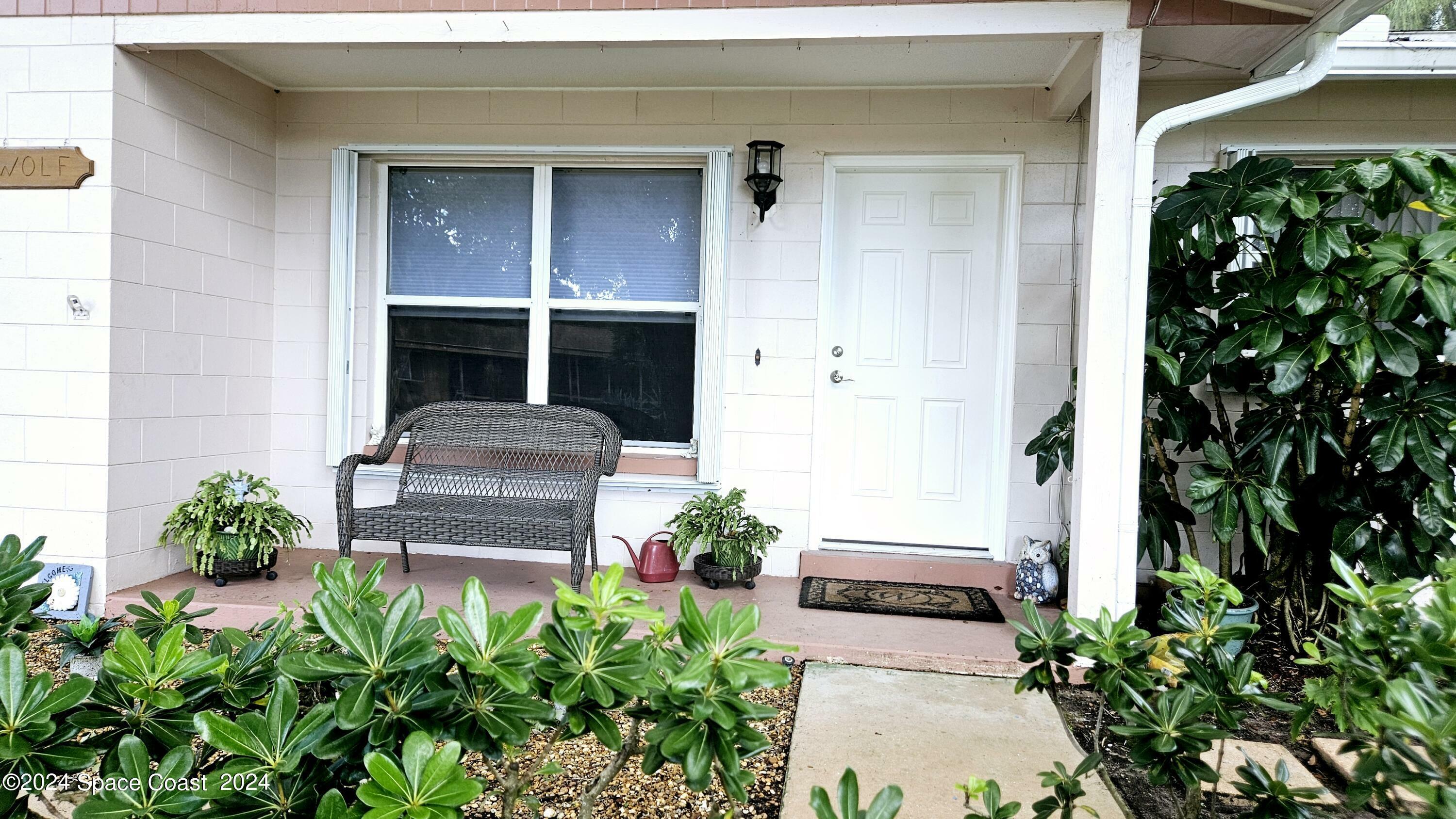 Property Photo:  100 N Tropical Way  FL 32952 