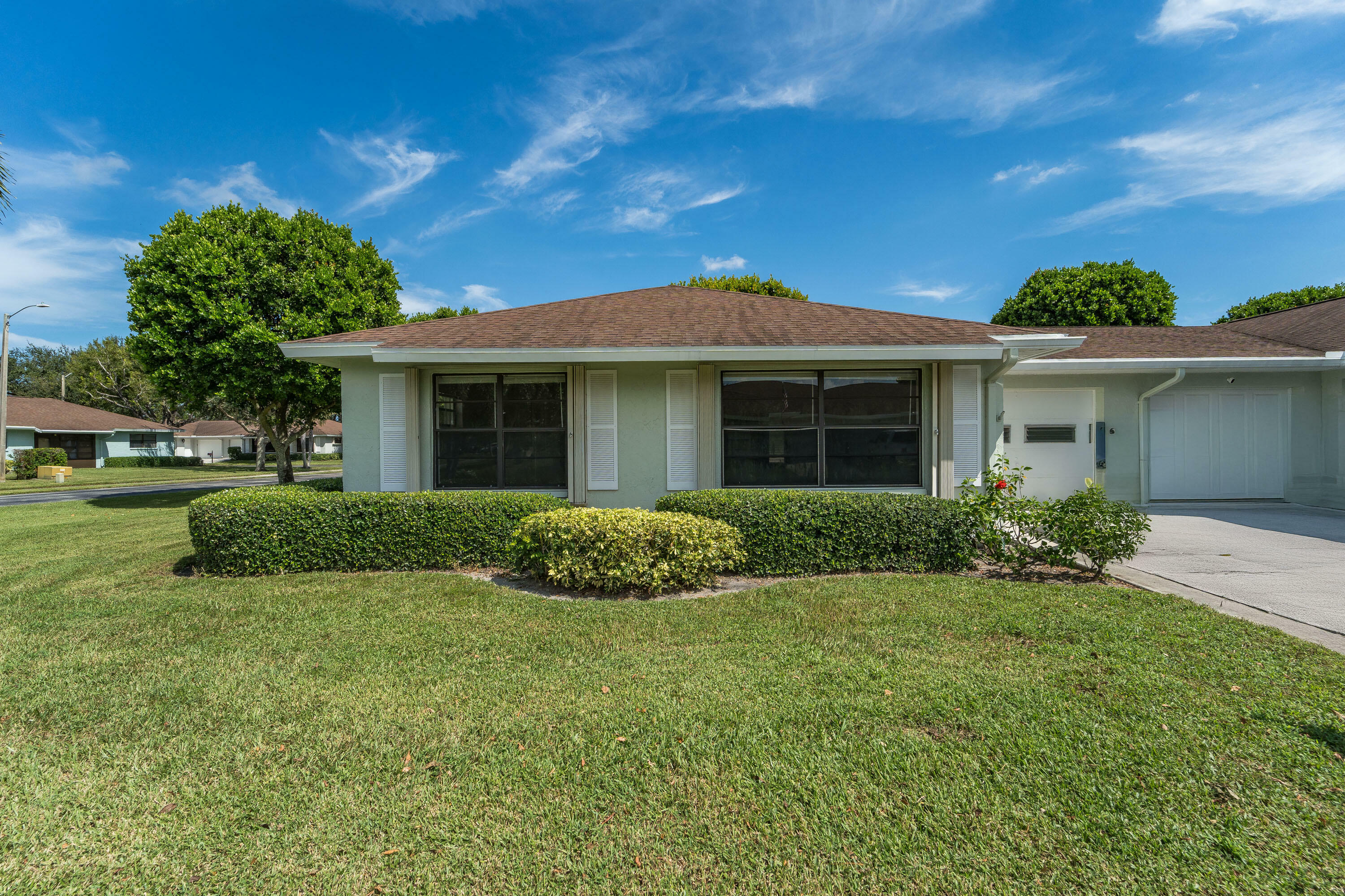 Property Photo:  9950 Ligustrum Tree Way A  FL 33436 