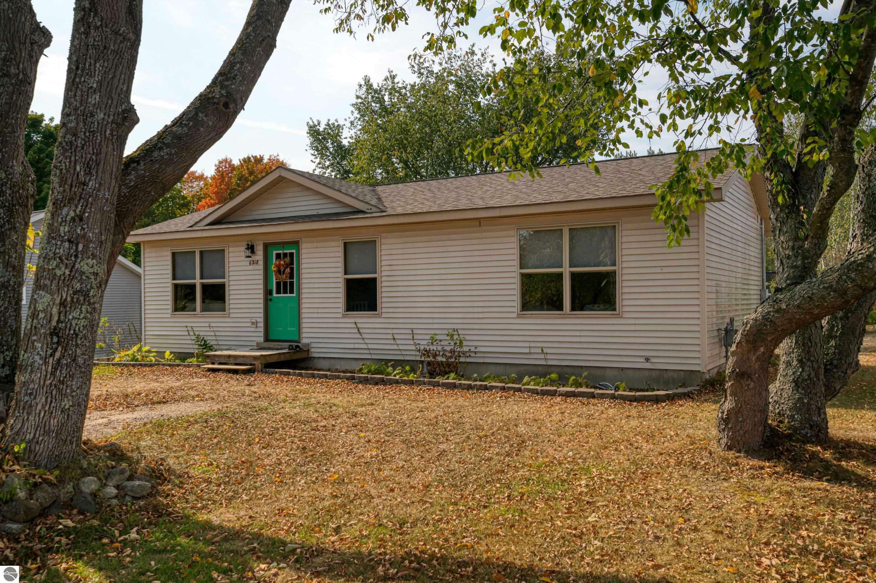 Property Photo:  6218 Sunset Drive  MI 49650 