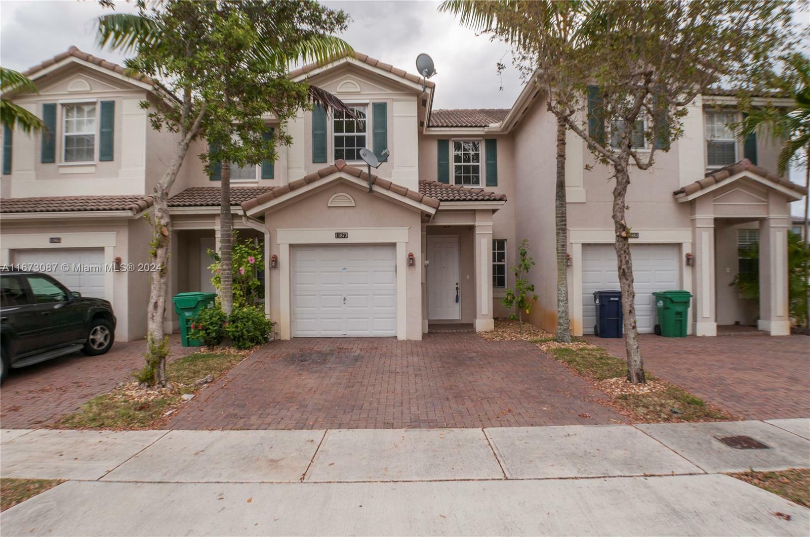 Property Photo:  11873 SW 152nd Ct 11873  FL 33196 