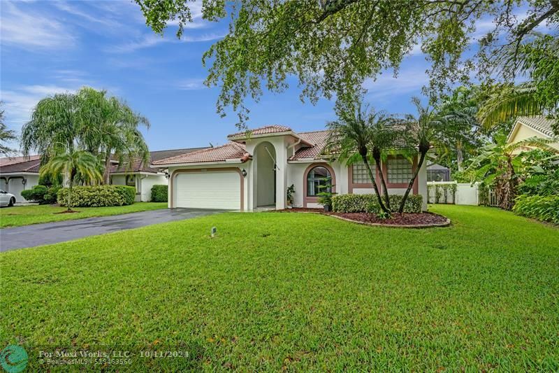 Property Photo:  5788 NW 48th Ct  FL 33067 