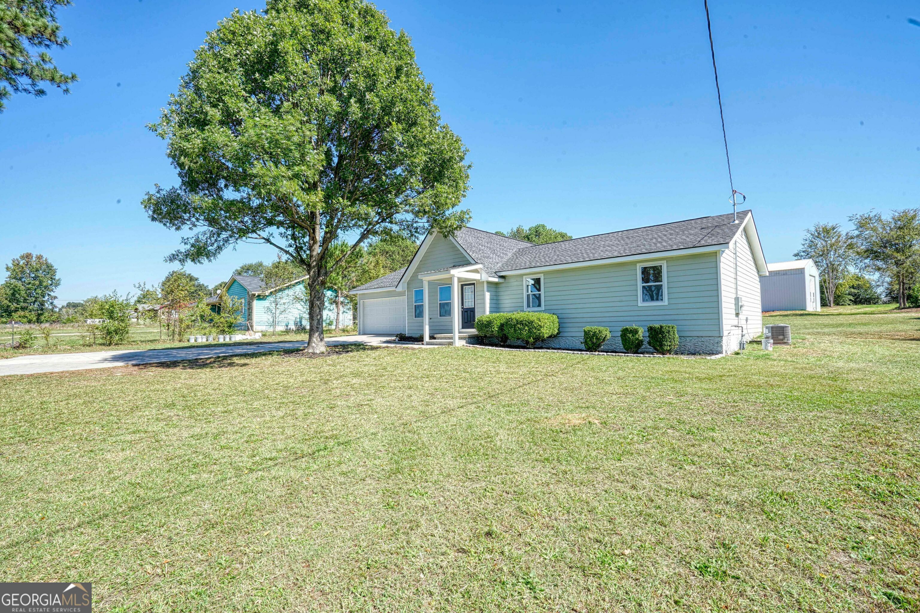 Property Photo:  11610 Highway 142  GA 30014 