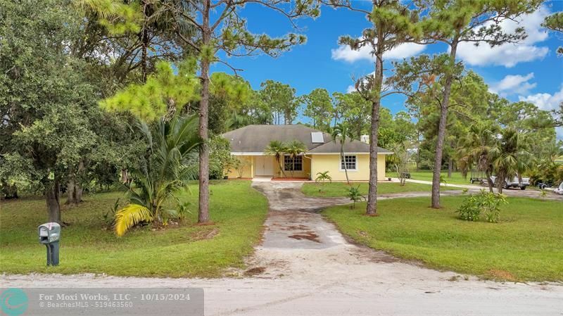 Property Photo:  17075 Orange Grove Blvd  FL 33470 