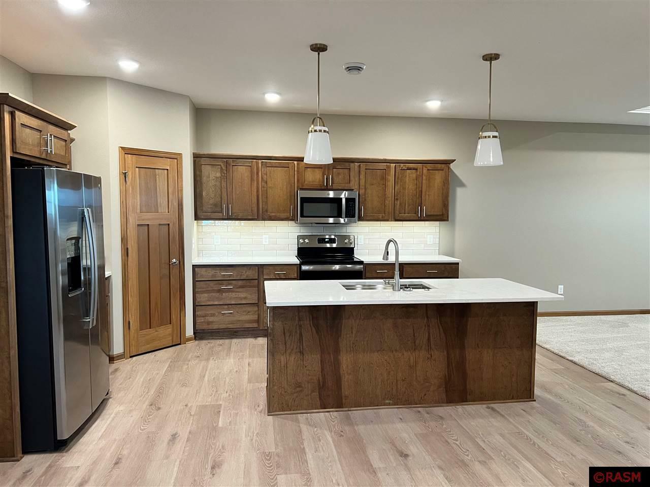 Property Photo:  3116 Bassett Drive  MN 56001 