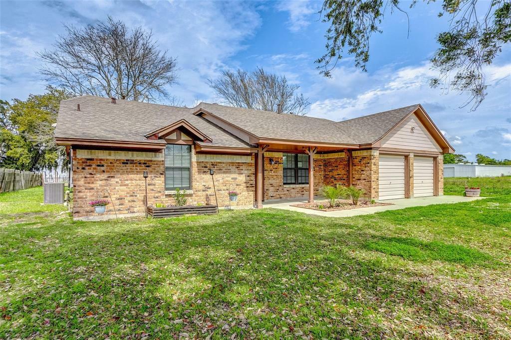 Property Photo:  405 Main Street  TX 77514 