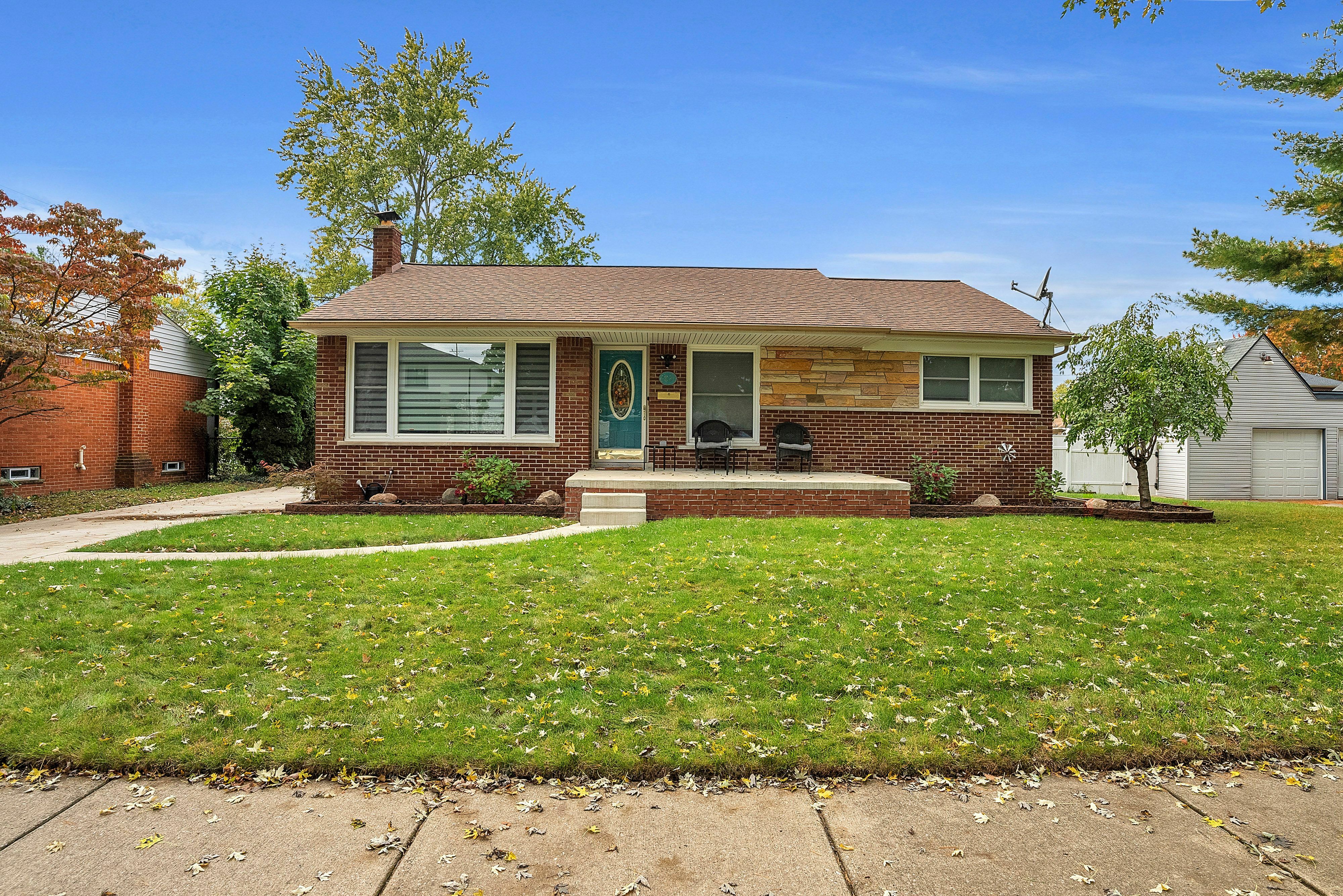 Property Photo:  6821 Kinmore Street  MI 48127 2038 