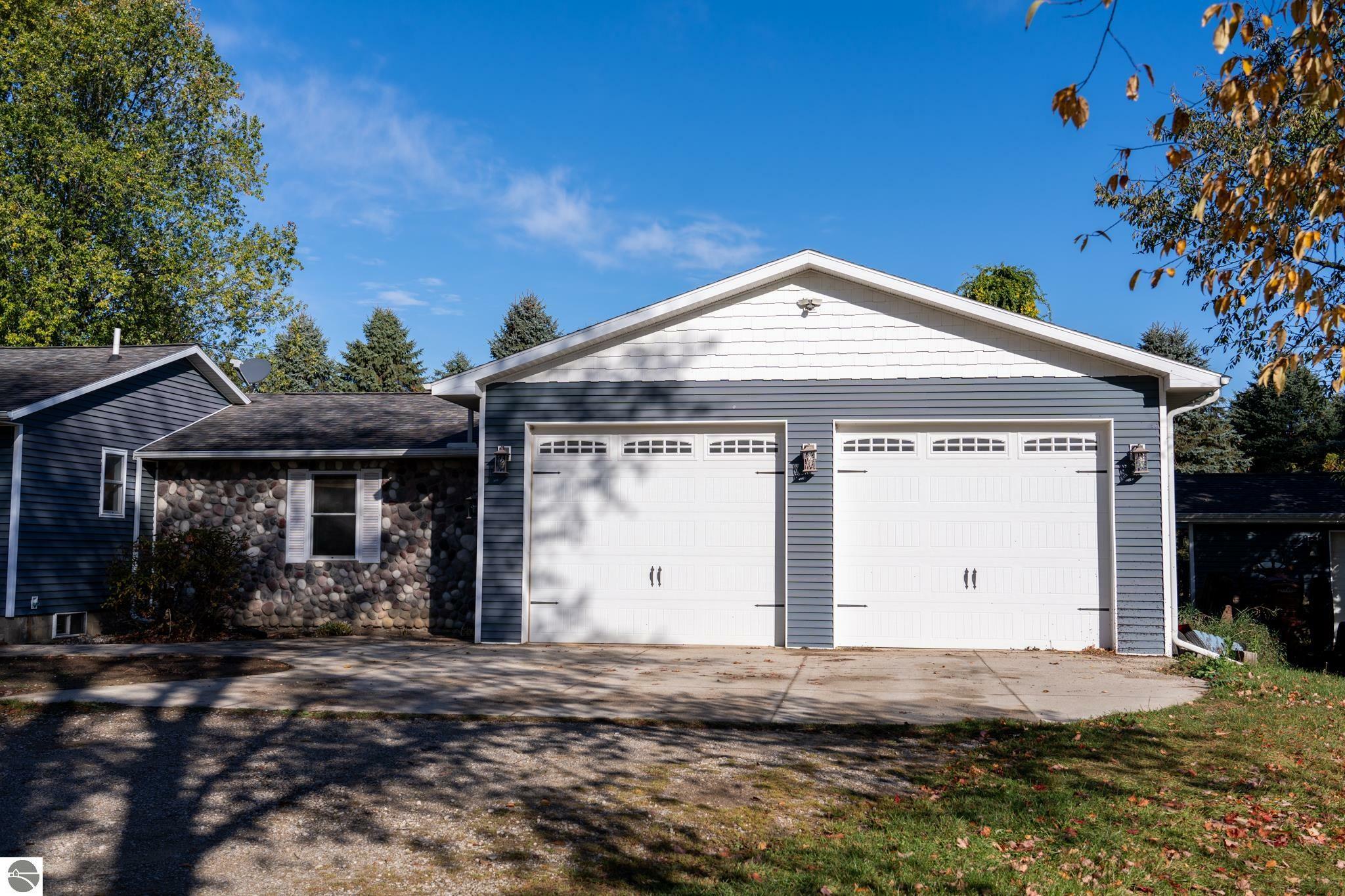 Property Photo:  6504 Bellinger Drive  MI 48858 