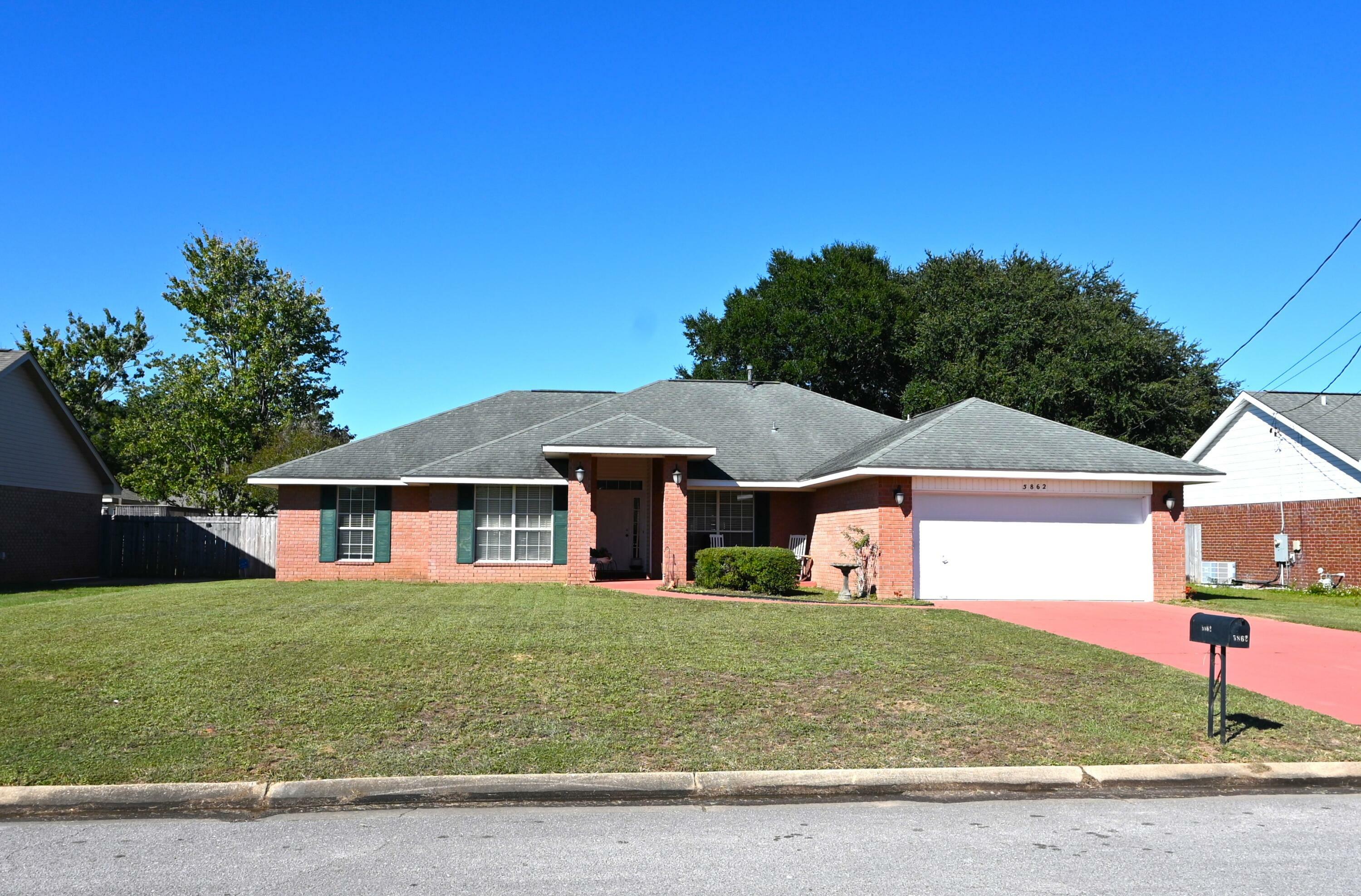 Property Photo:  5862 Admirals Road  FL 32583 