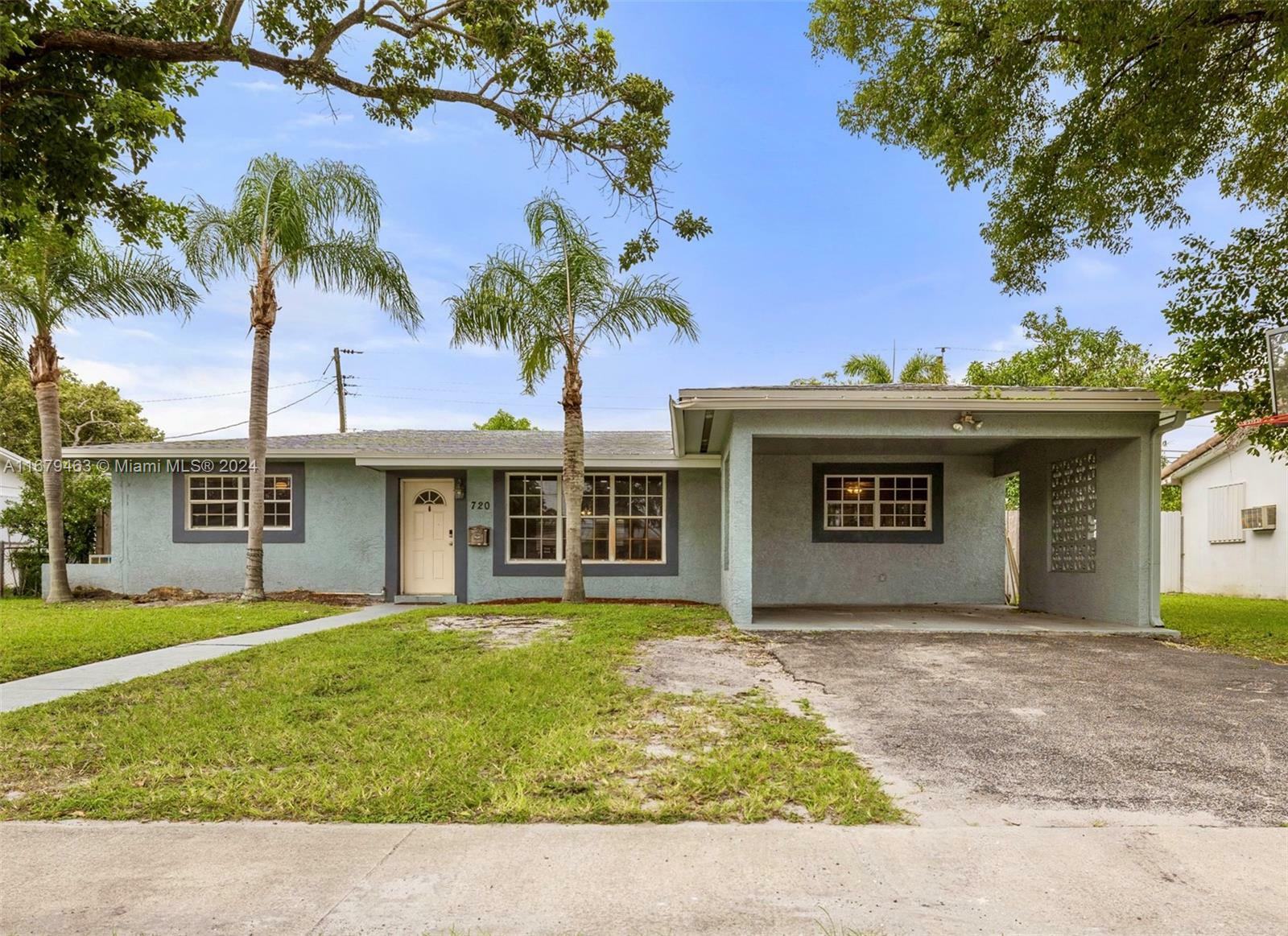 Property Photo:  720 SW 69th Way  FL 33023 