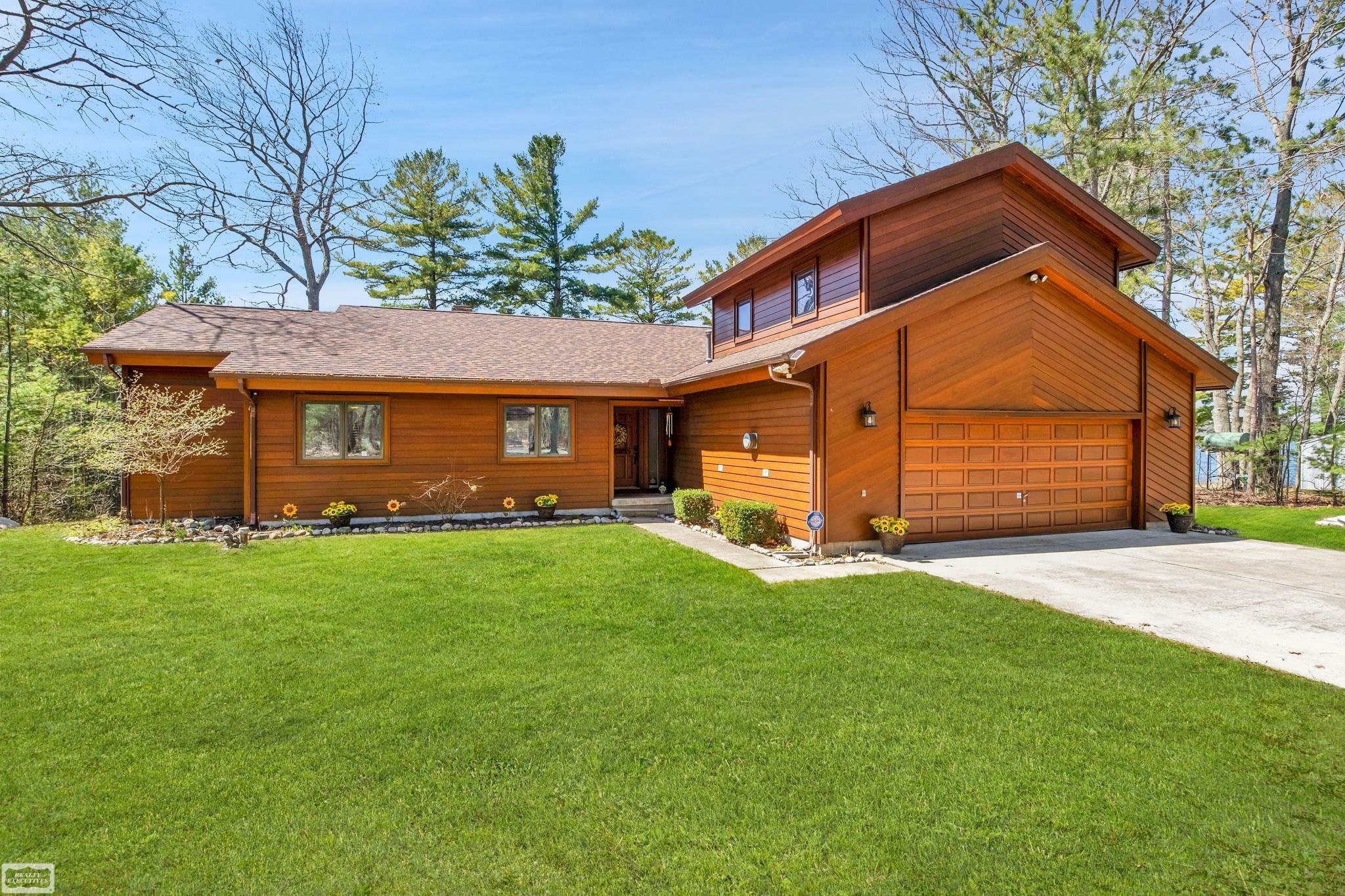 Property Photo:  7017 Loud Drive  MI 48750 