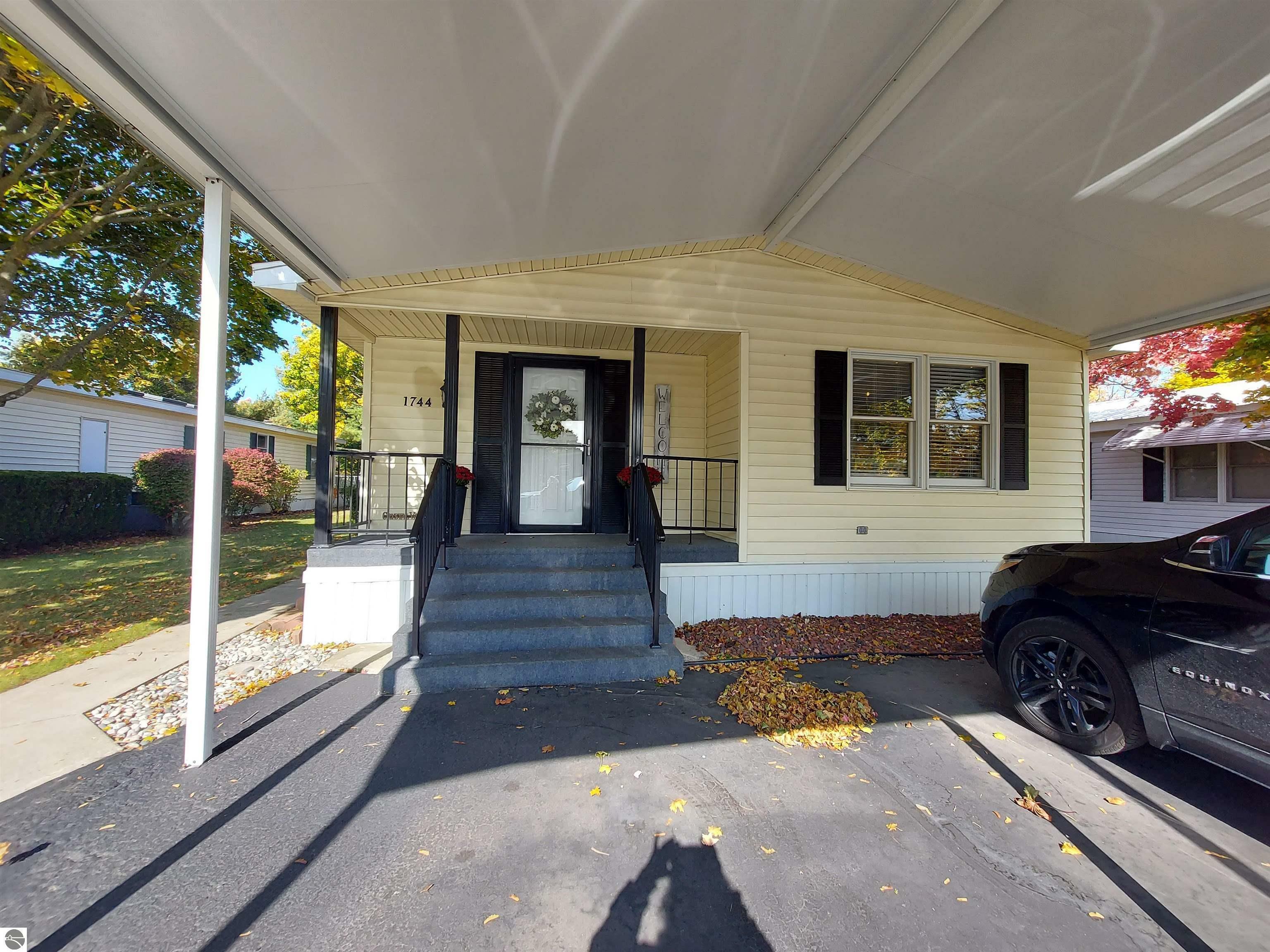 Property Photo:  1744 David Place  MI 49686 