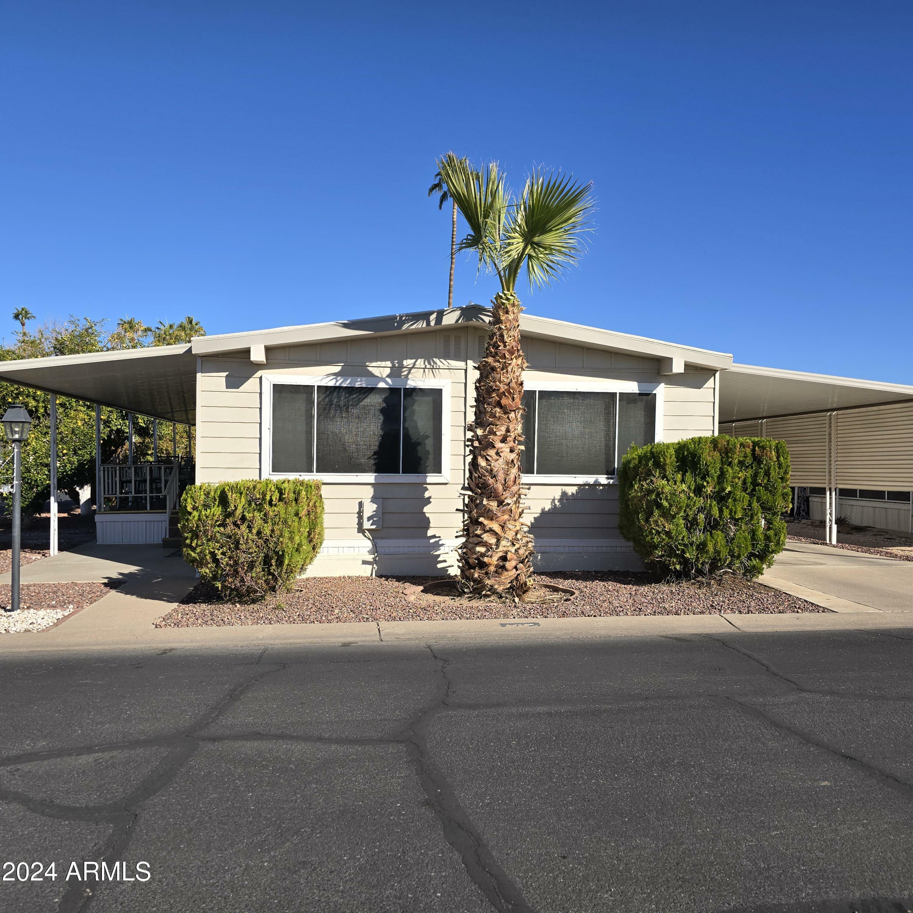 Property Photo:  11411 N 91st Avenue 185  AZ 85345 