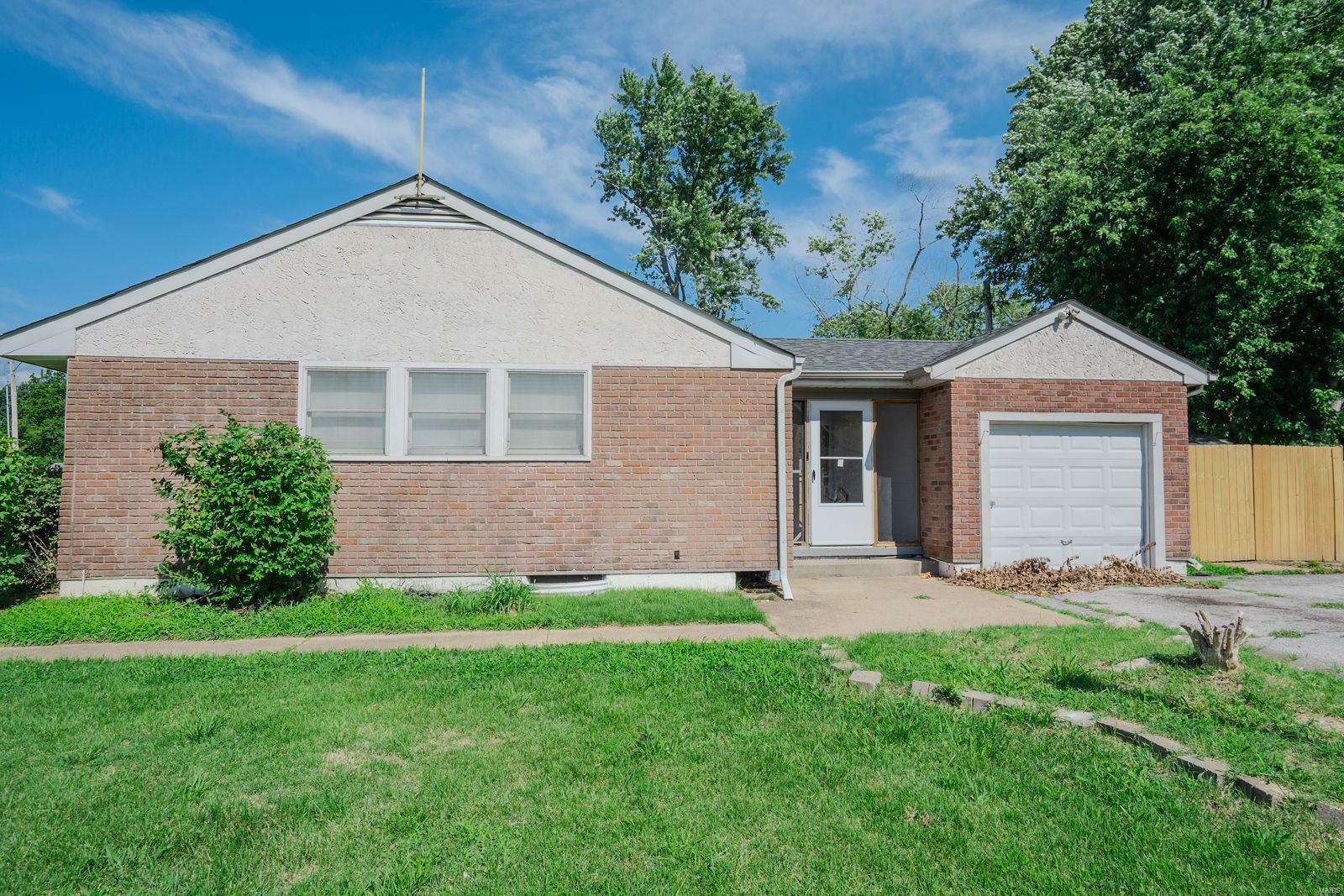 Property Photo:  324 Shepley Drive  MO 63137 