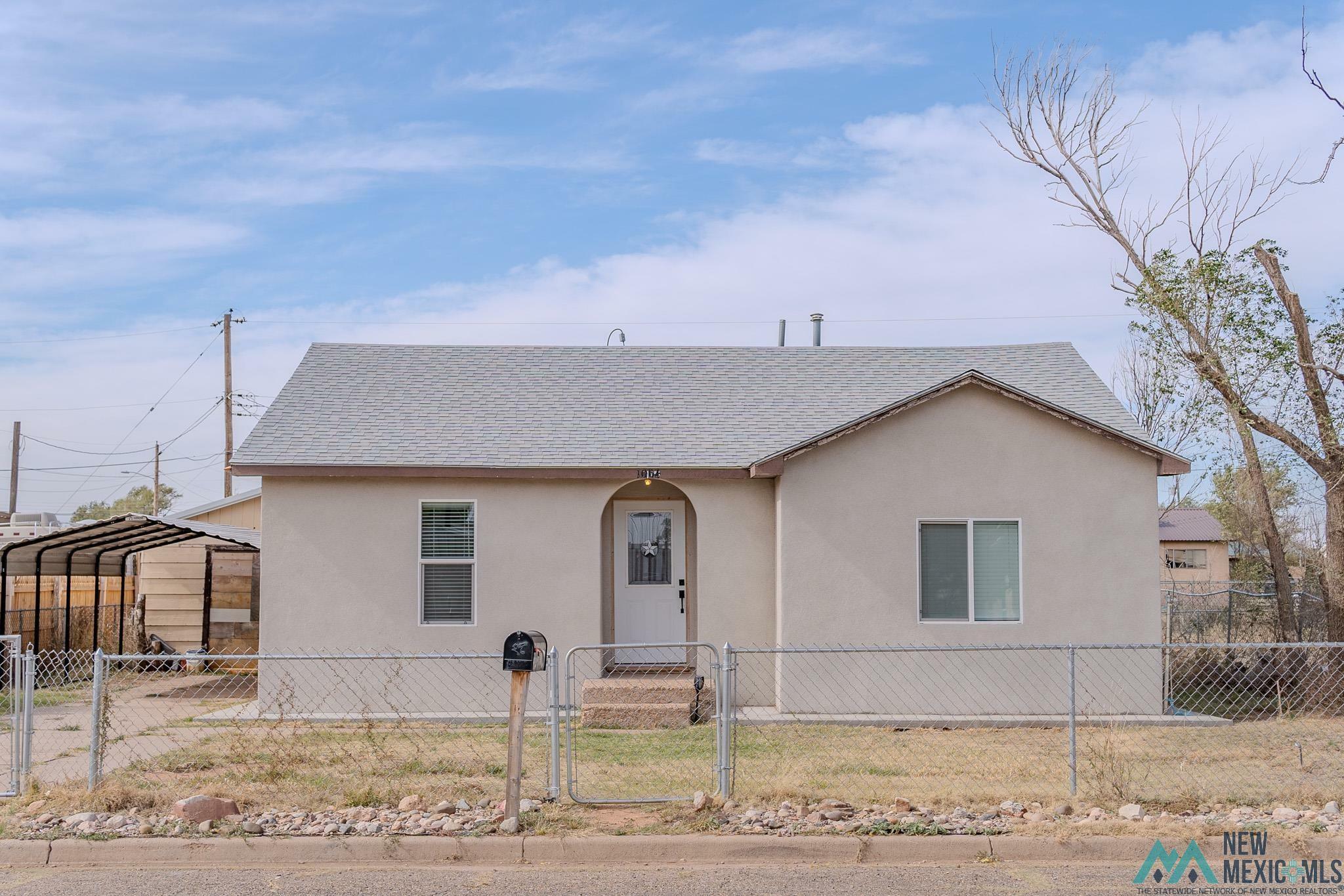 Property Photo:  1004 Chama Street  NM 88101 