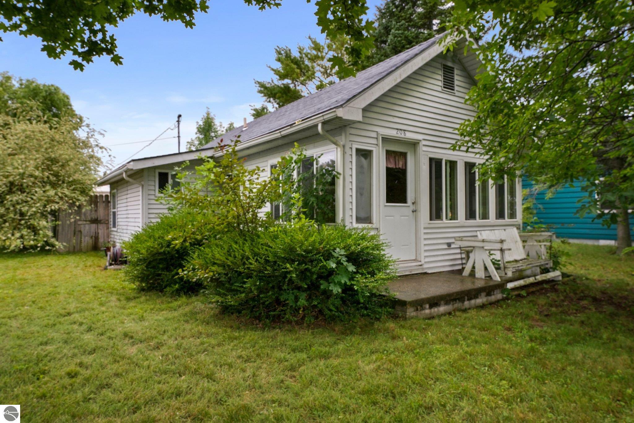 Property Photo:  208 Lake  MI 49629 