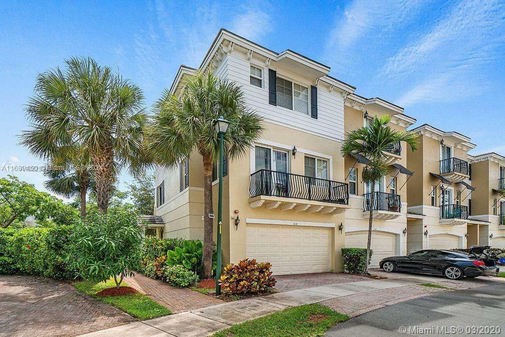 Property Photo:  612 NW 38th Cir 612  FL 33431 