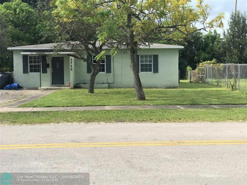 Property Photo:  1713 NW 14th Ct  FL 33311 