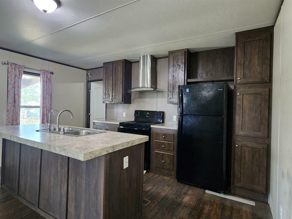 Property Photo:  188 County Road 3574  TX 77327 