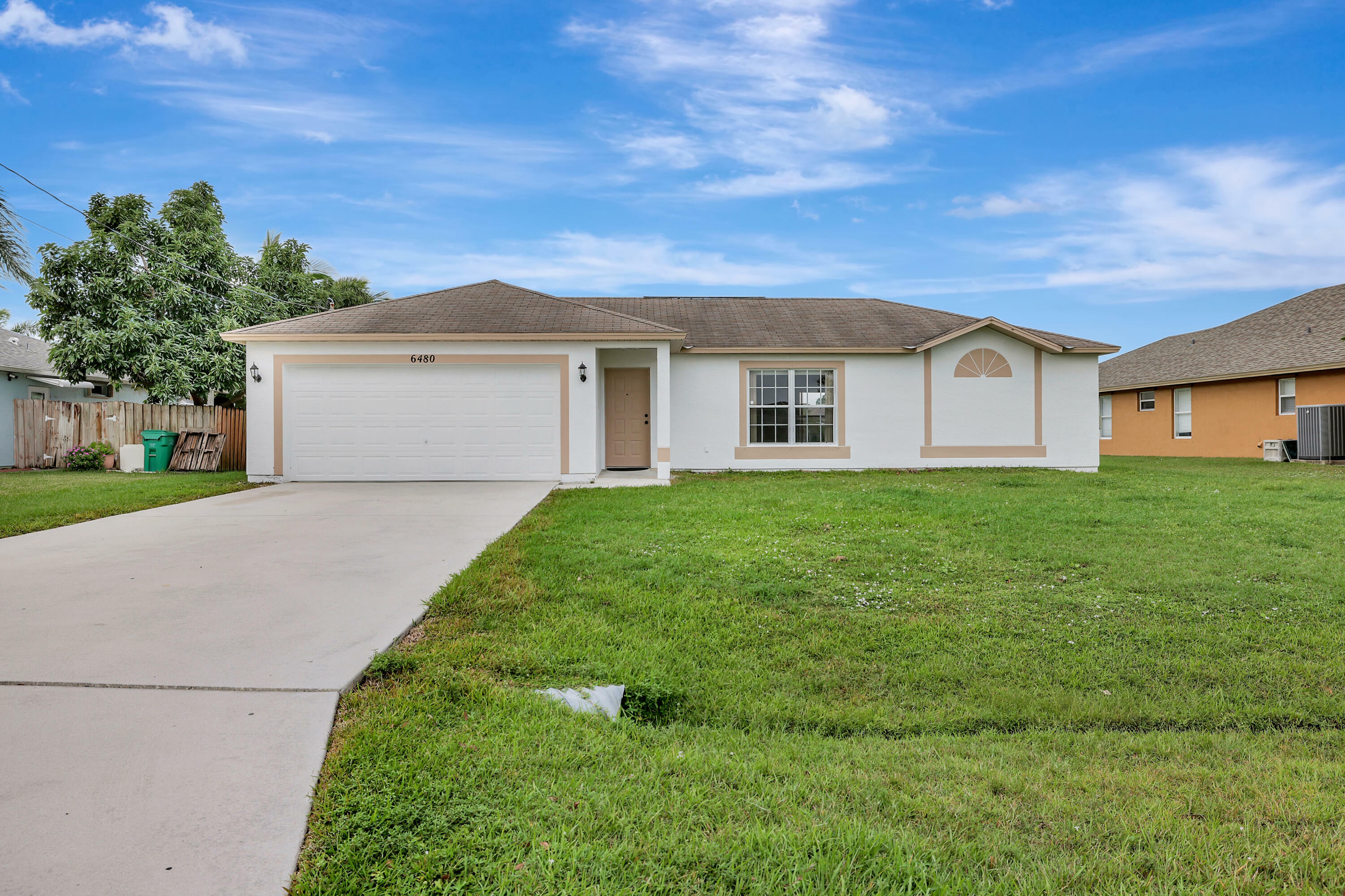 Property Photo:  6480 NW Volucia Drive  FL 34986 