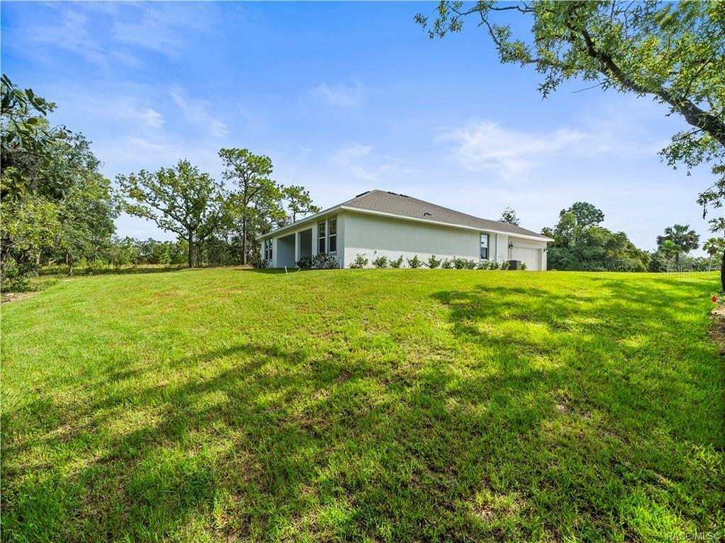 Property Photo:  874 N Man O War Drive  FL 34453 