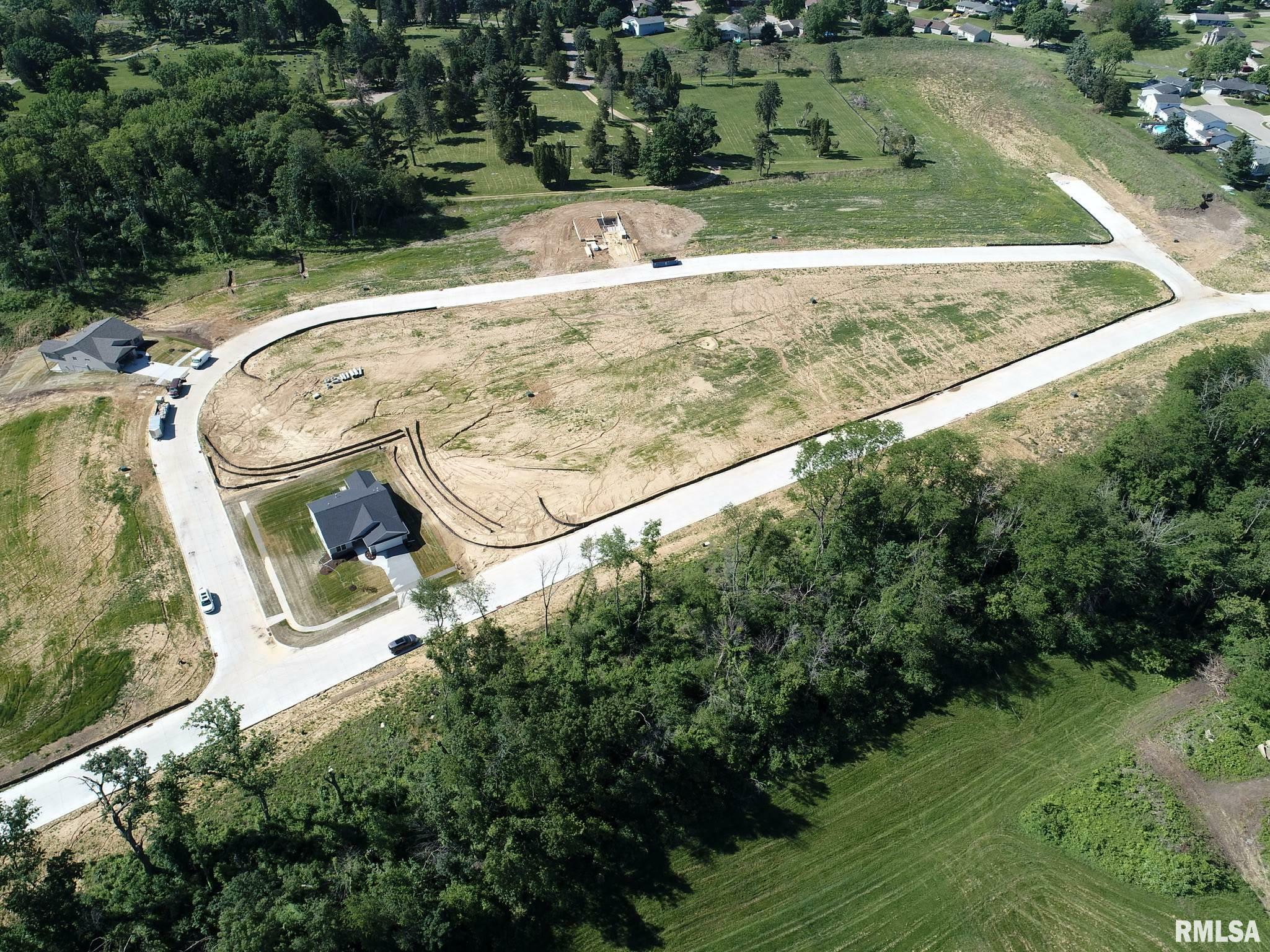 Property Photo:  913 Riverstone Road  IA 52732 