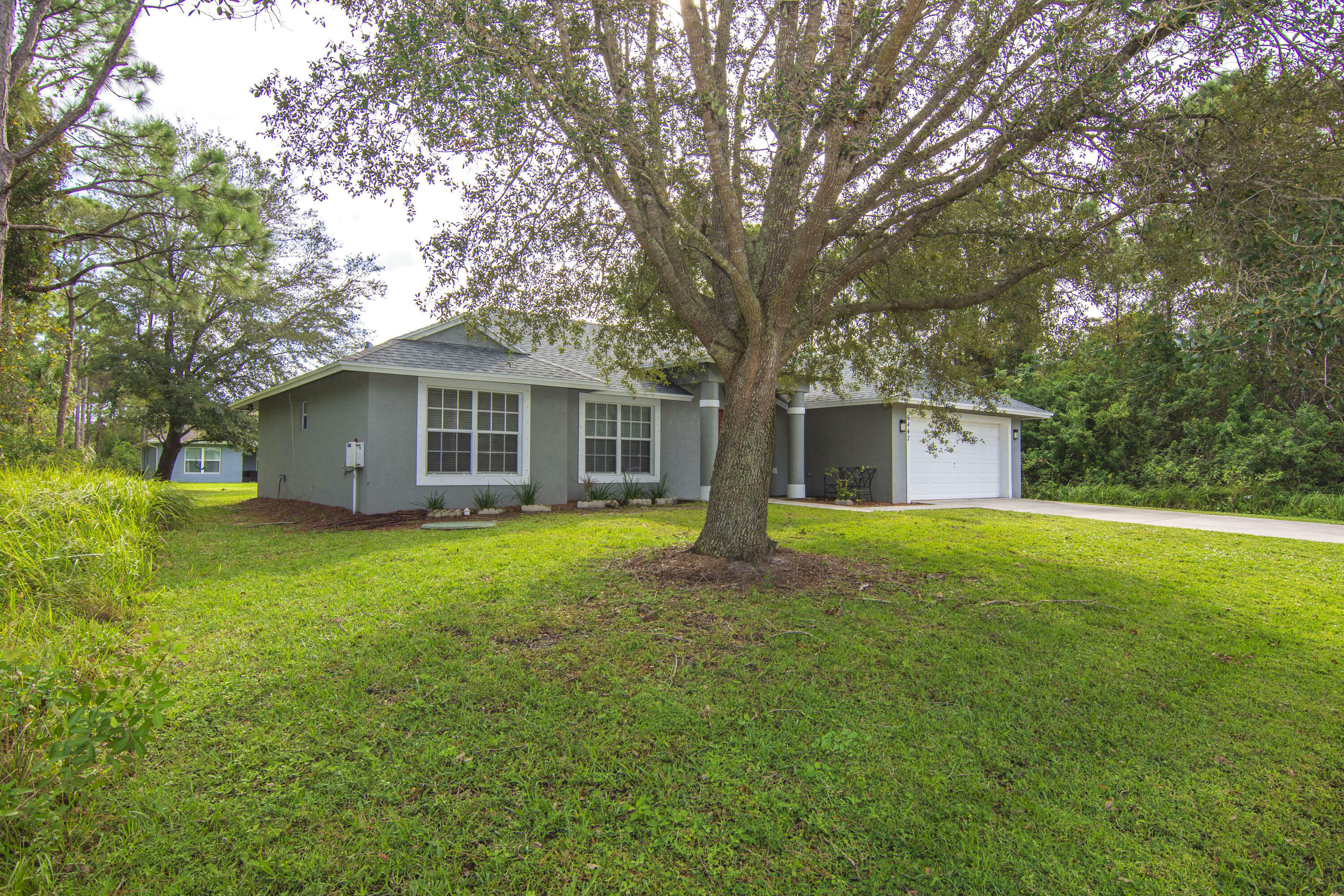 Property Photo:  6447 NW Foxglove Street  FL 34986 