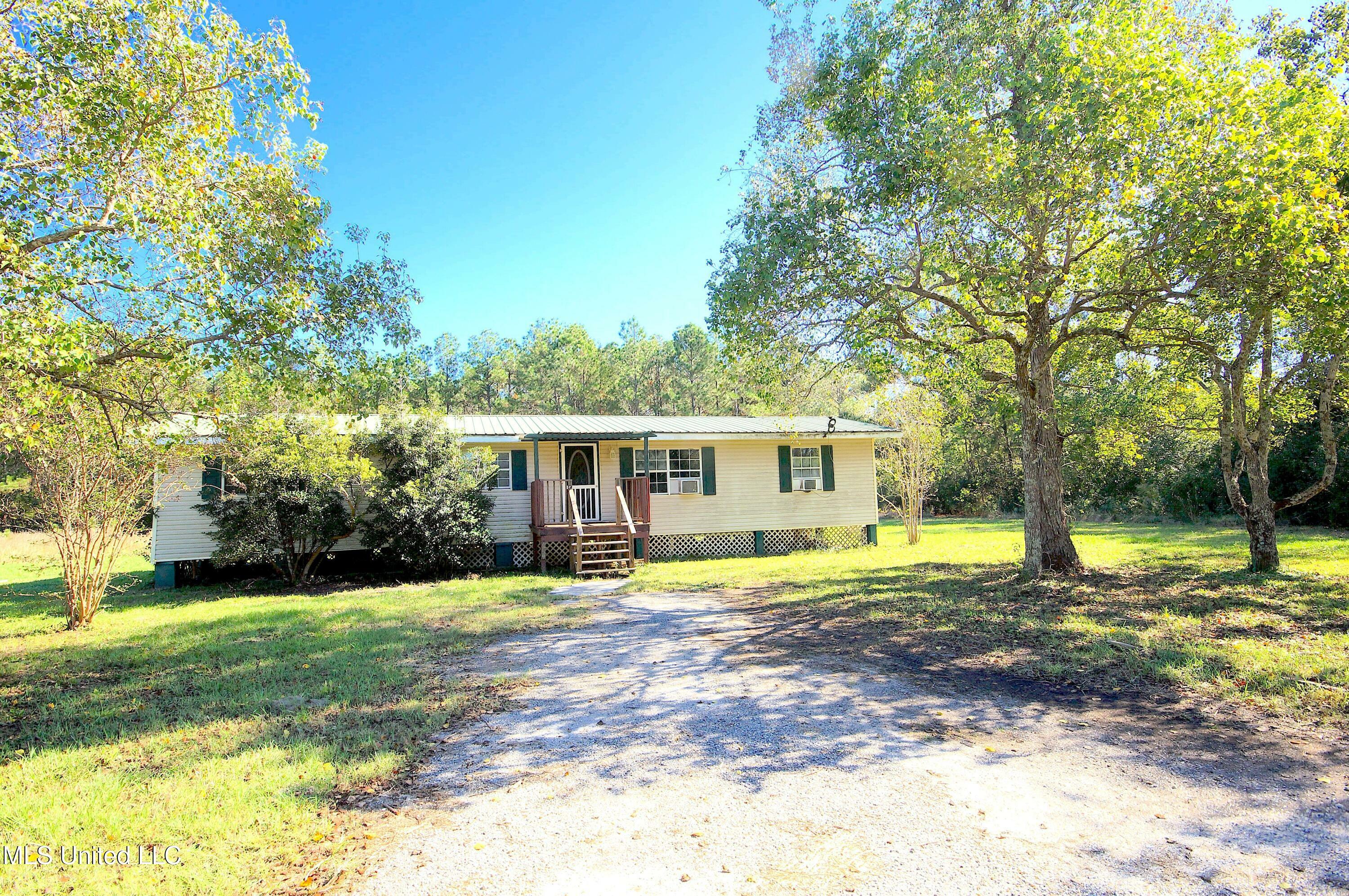 Property Photo: 5930 Lower Bay Road MS 39520