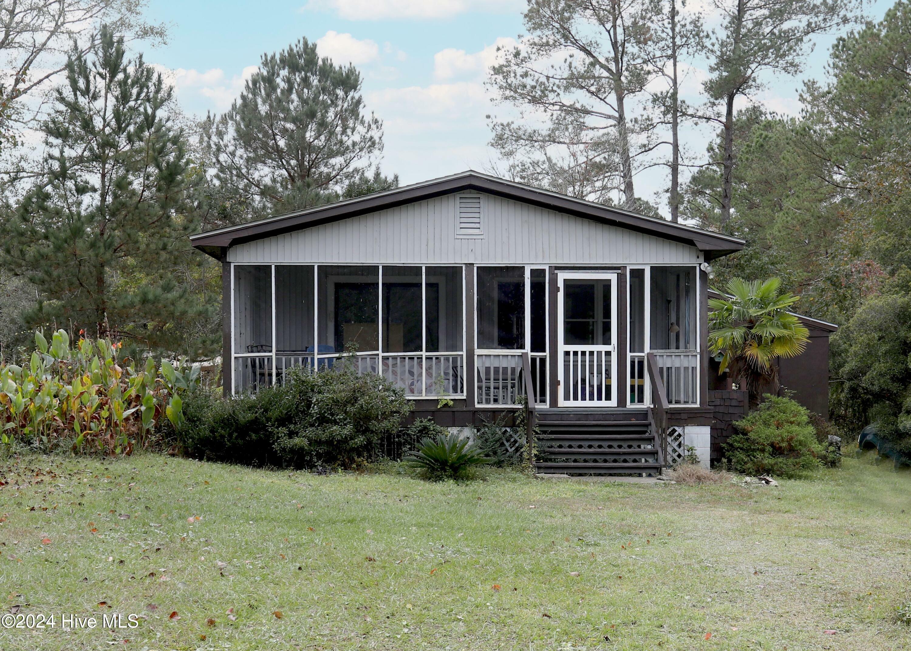 Property Photo: 408 Old Folkstone Road NC 28445