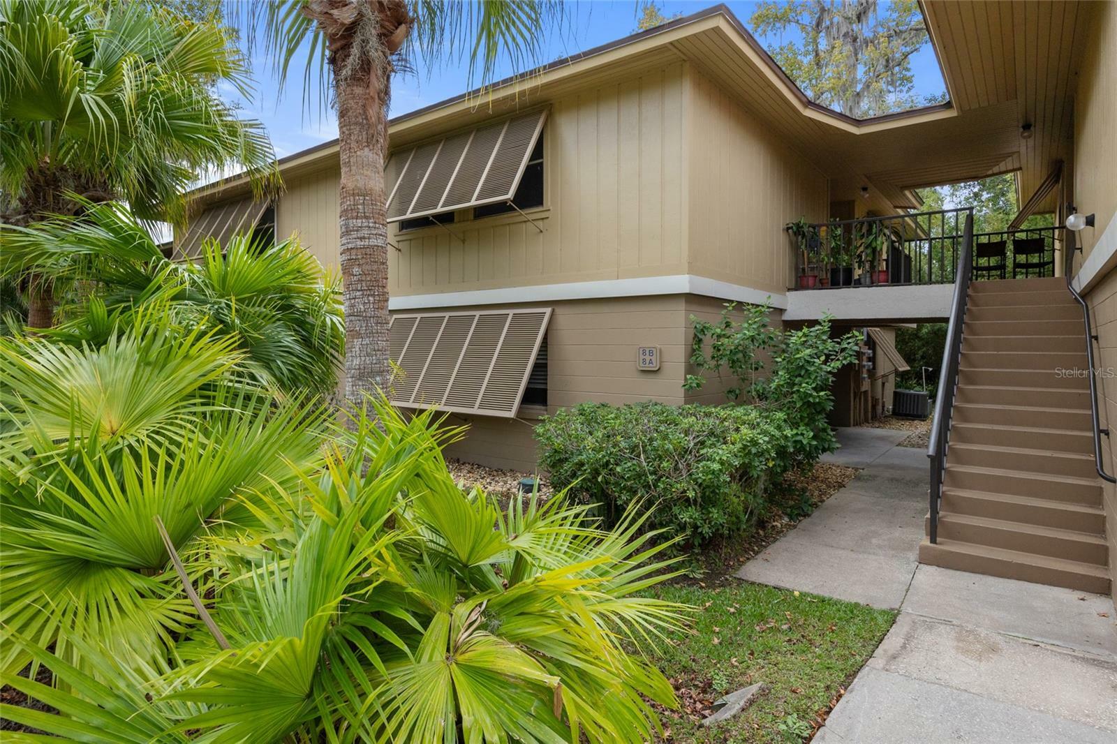 Property Photo:  140 Orchid Woods Court 8B  FL 32725 