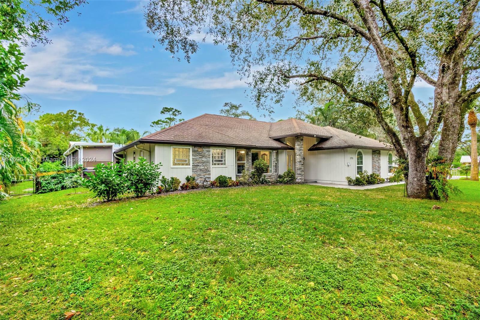 Property Photo:  17923 N 128th Trl N  FL 33478 