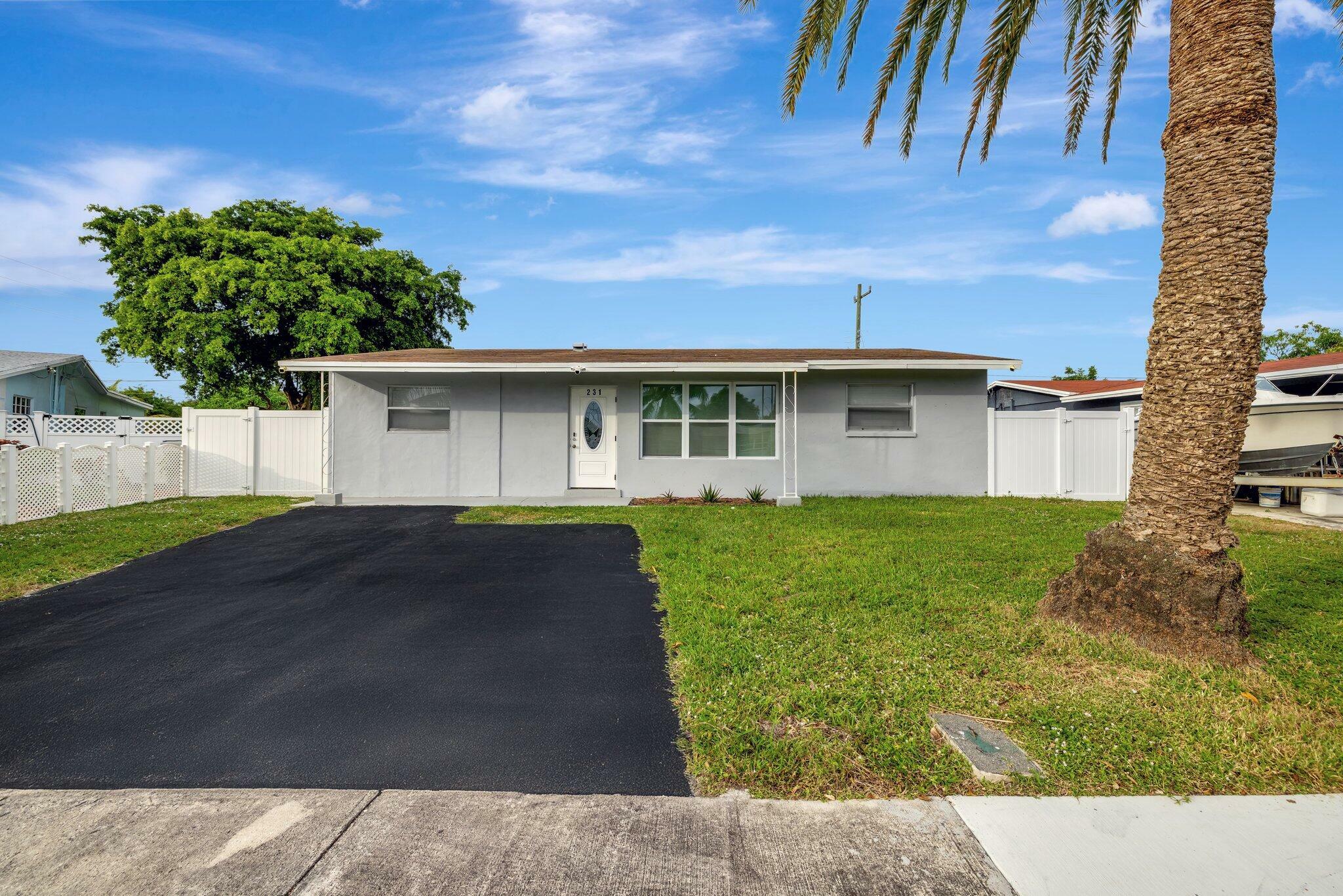 Property Photo:  231 NW 21st Street  FL 33060 