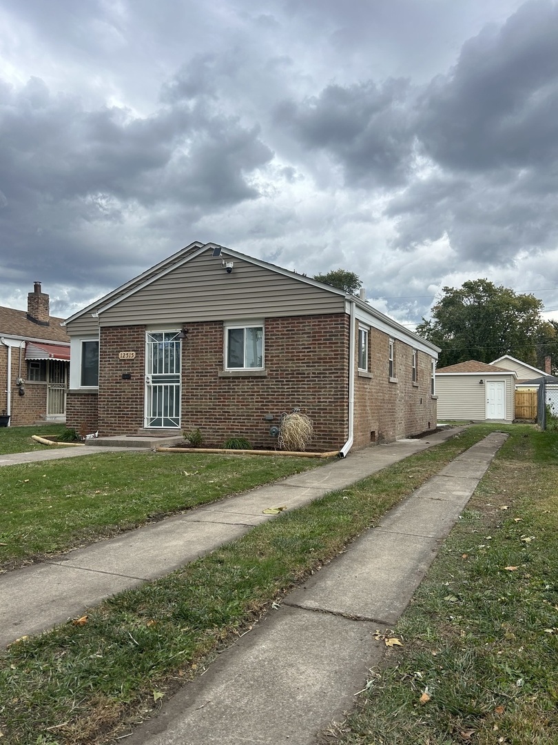 Property Photo:  12515 S Ada Street  IL 60827 